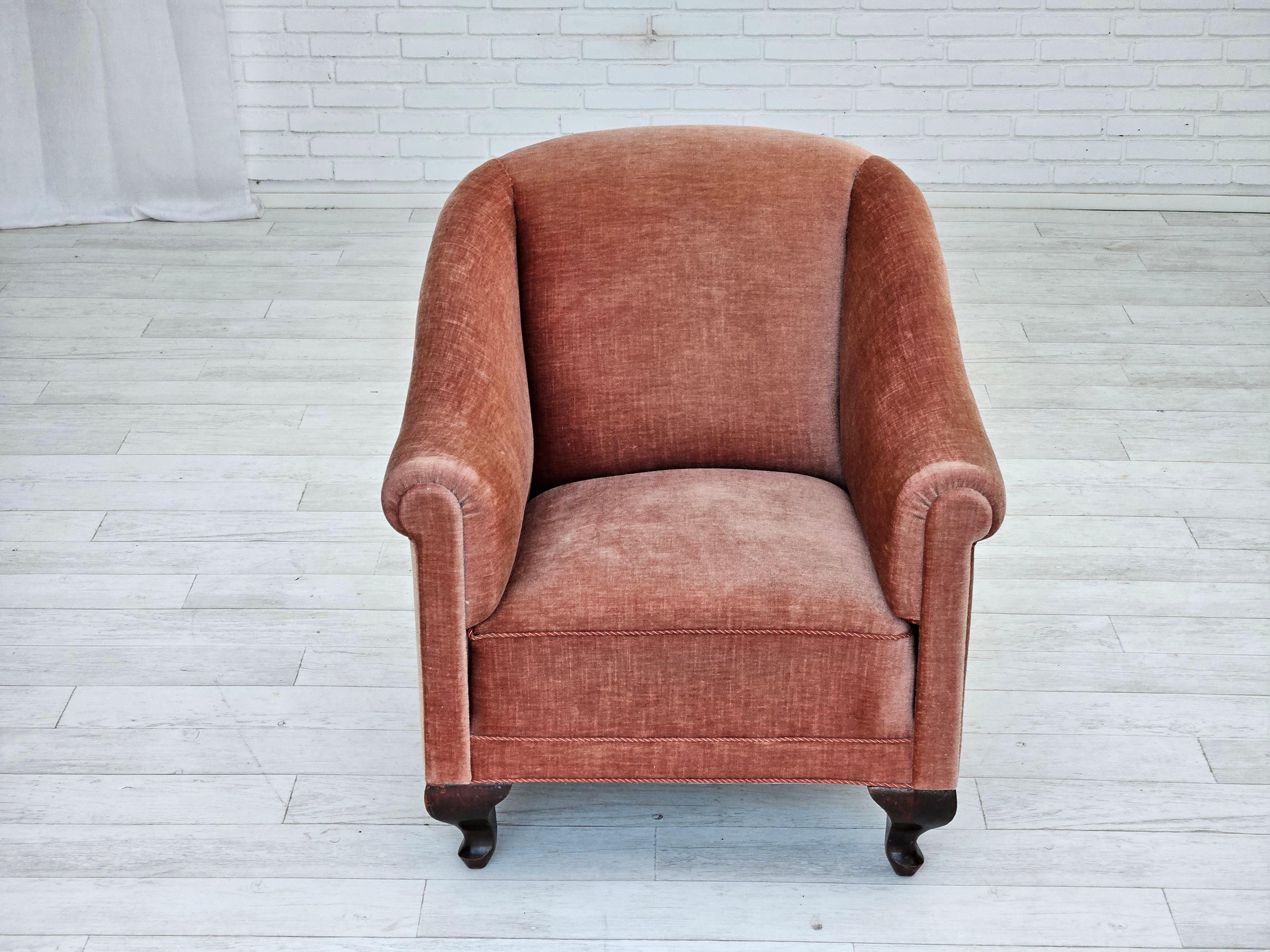 Scandinavian Modern 1960s, Danish lounge chair, salmon pink furniture velour, ash wood legs. For Sale