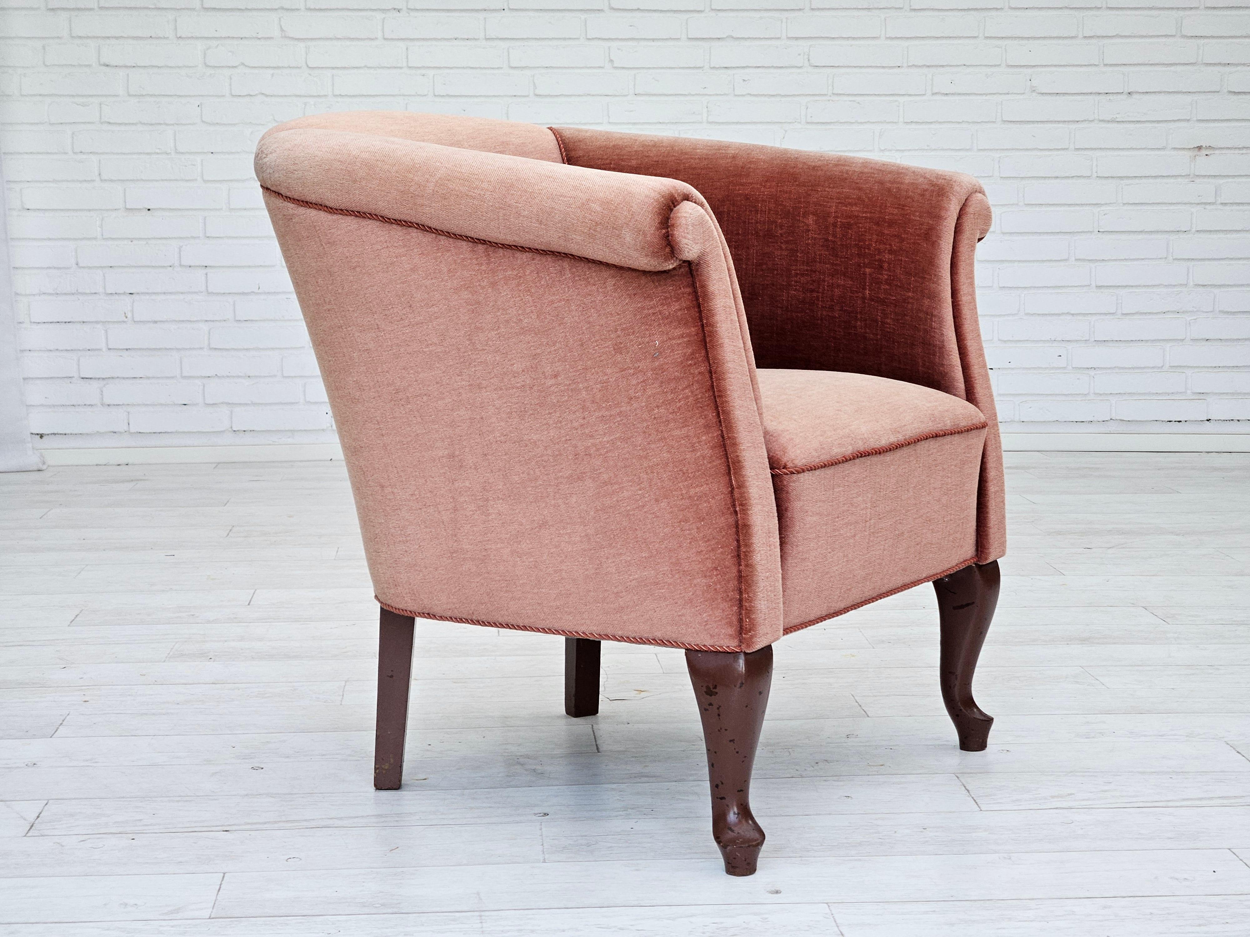 Scandinavian Modern 1960s, Danish lounge chair, salmon pink furniture velour, ash wood legs. For Sale