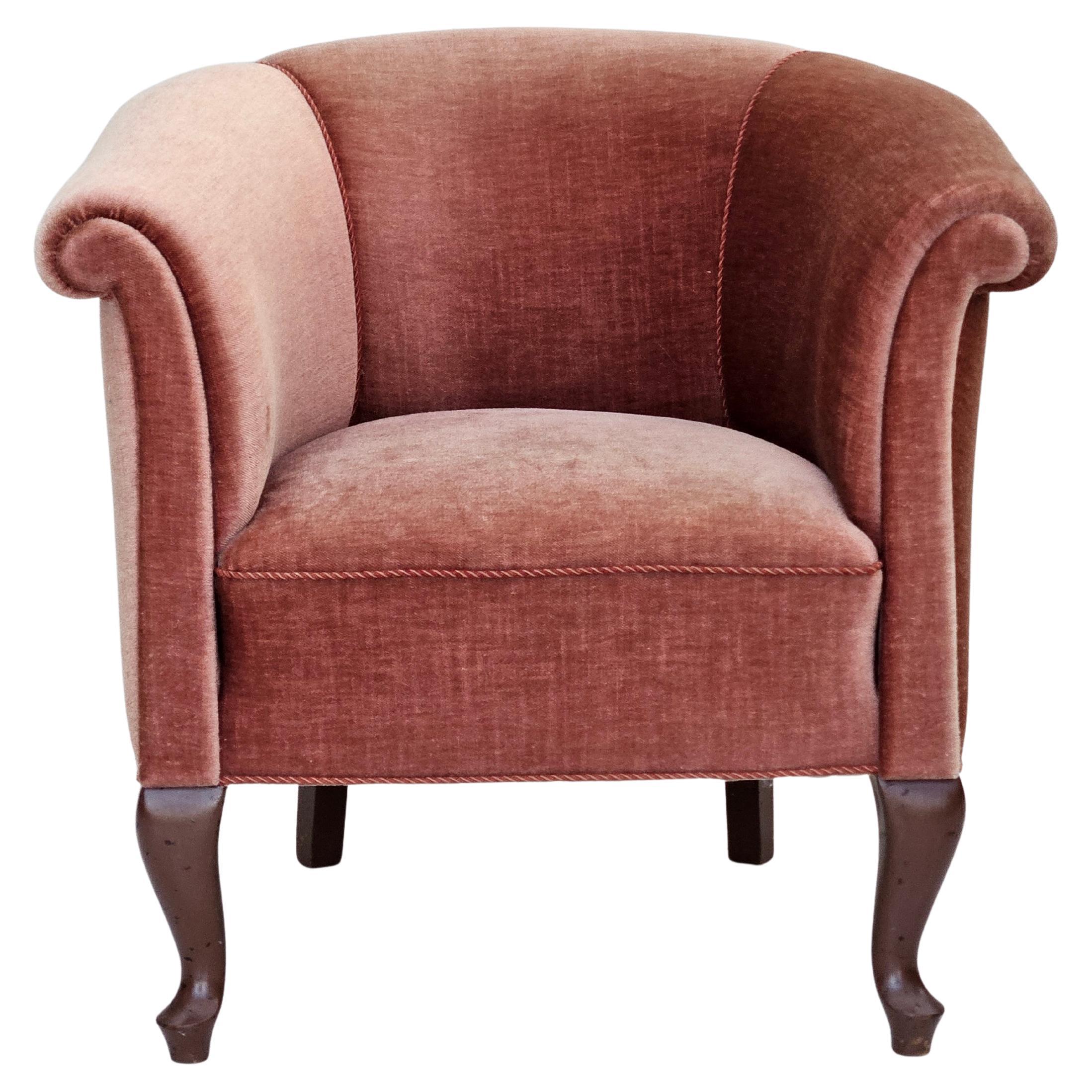 1960s, Danish lounge chair, salmon pink furniture velour, ash wood legs.