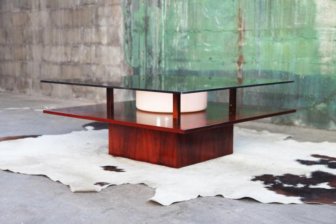 Absolutely stunning, one-of-a-kind, RARE, high-end designer Rosewood and smoked glass original Mid Century table in excellent condition. It is produced my Mobelintarsia Denmark, and the designer is unknown. This table is strikingly unique and makes