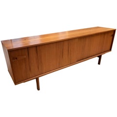 1960s Danish Modern Long Teak Credenza with Sliding Doors