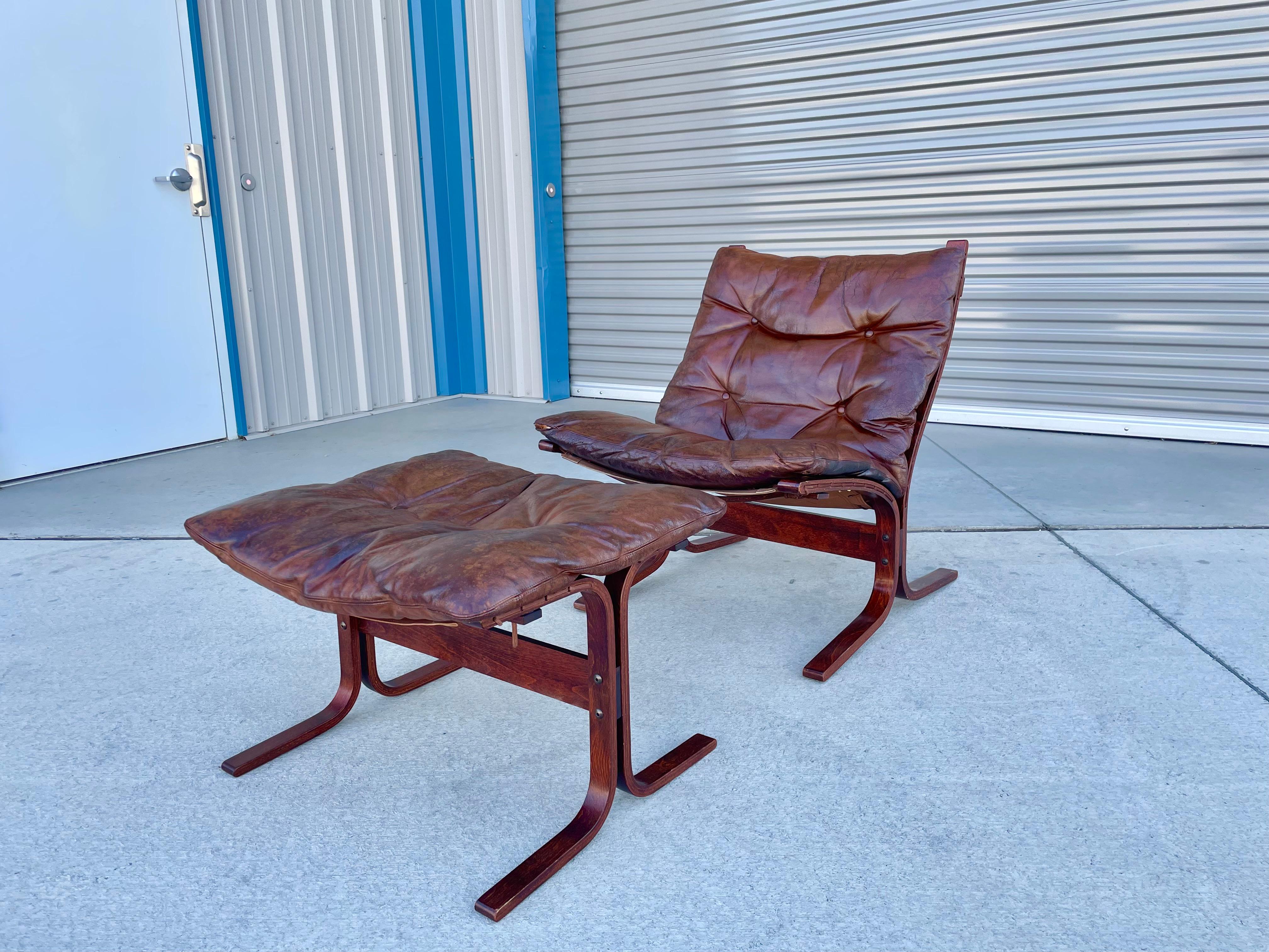 Danish modern lounge chair and ottoman was designed by Ingmar Relling and manufactured by westnofa in Norway circa 1960s. This lounge chair is absolutely stunning, featuring a sleek bentwood frame and a beautiful brown leather upholstery. The