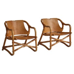 1960s Danish Modern "Manilla" Lounge Chairs in Bamboo, Rattan and Saddle Leather
