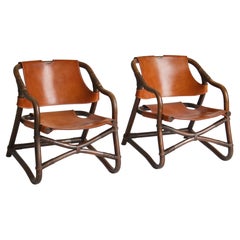 1960s Danish Modern "Manilla" Lounge Chairs in Stained Bamboo and Saddle Leather