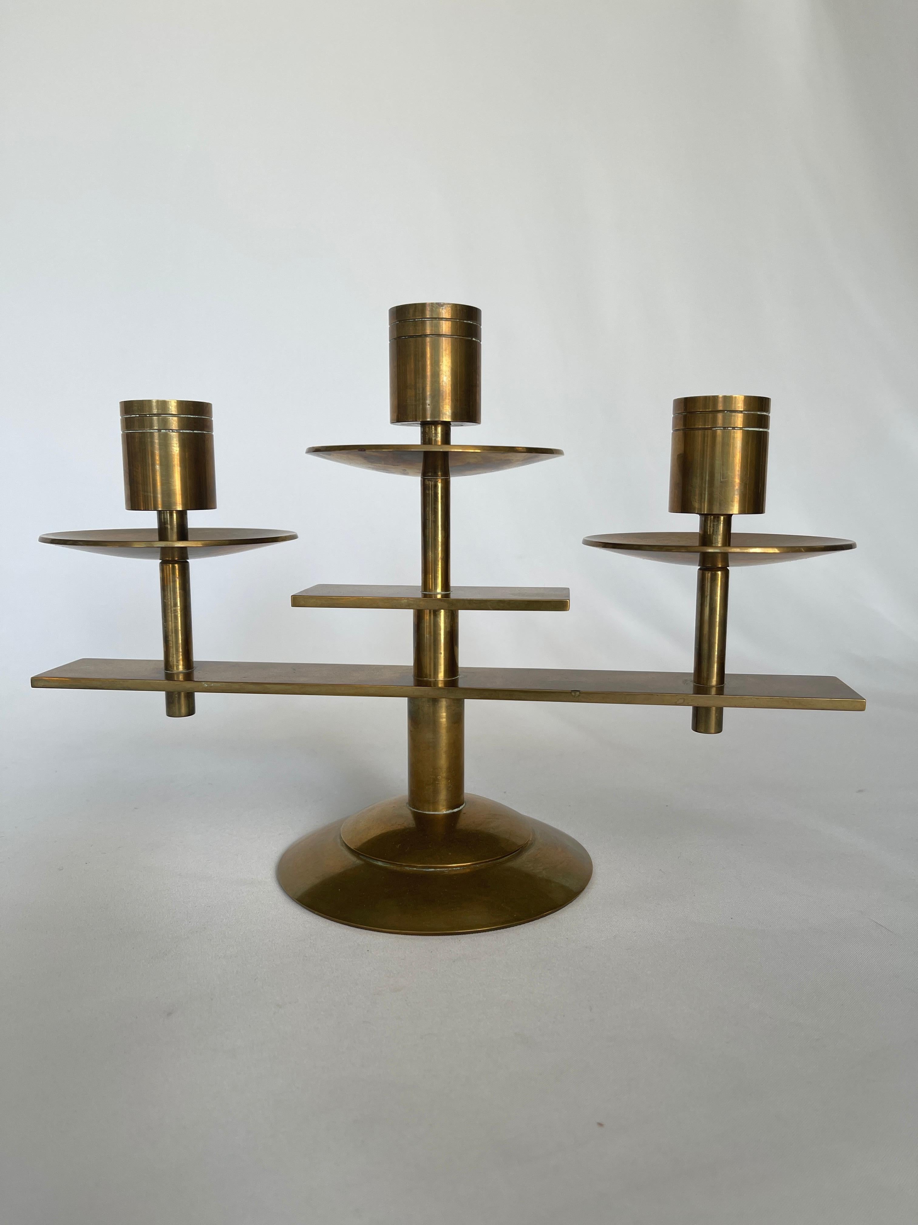 Danish modern heavy brass candelabra with three candle holders crafted by Dantorp, Denmark, c. 1960's.