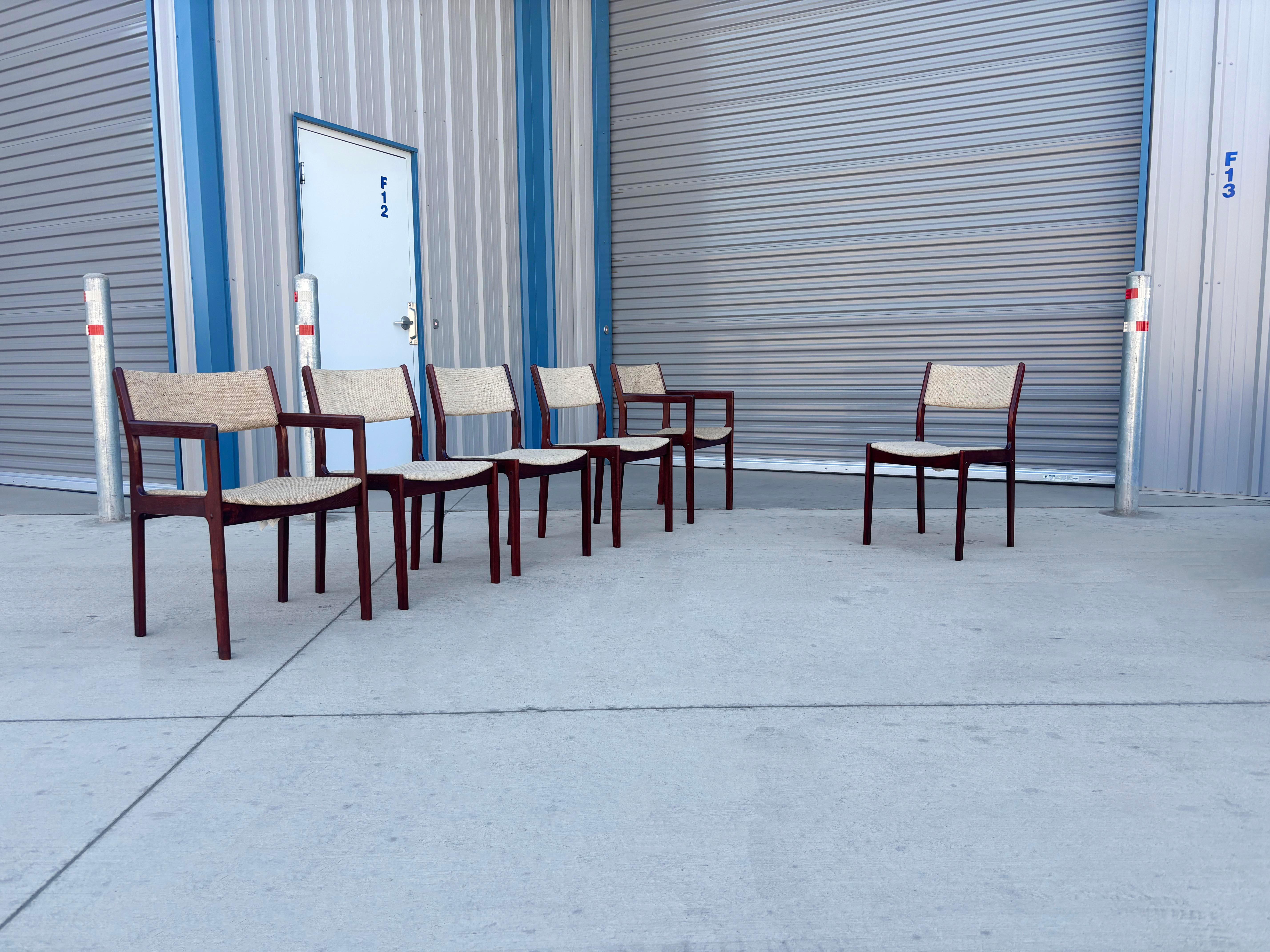 ✨ Danish Modern Teak Dining Chairs — Set of Six ✨

Elevate your dining space with this exquisite set of six Danish modern teak dining chairs, crafted in Denmark circa 1960s. Featuring four sleek side chairs and two graceful armchairs, this