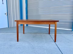 1960s Danish Modern Teak Extending Dining Table with Self-Storing Draw Leaves