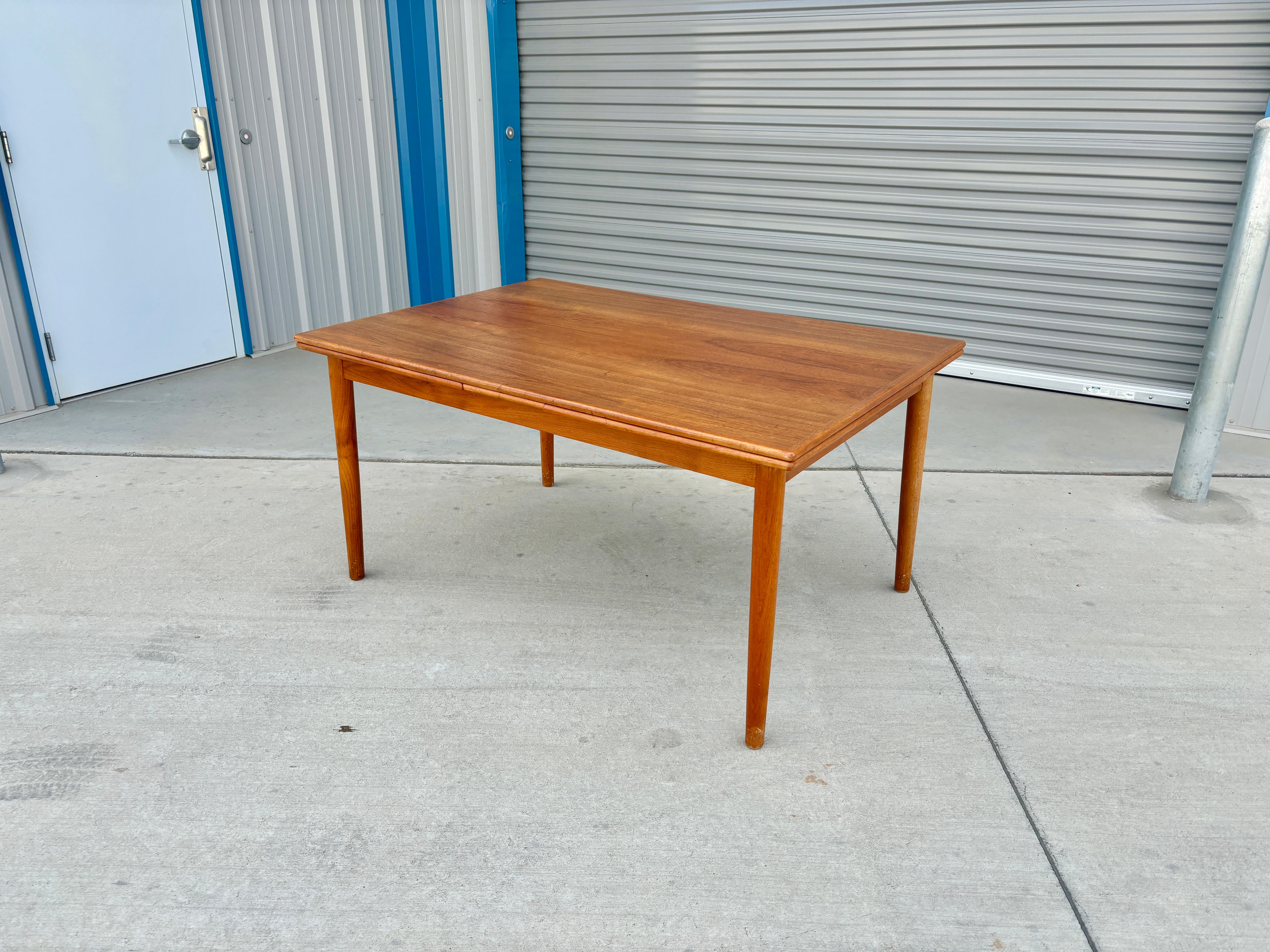 Mid-Century Modern 1960s Danish Modern Teak Extendable Dining Table For Sale