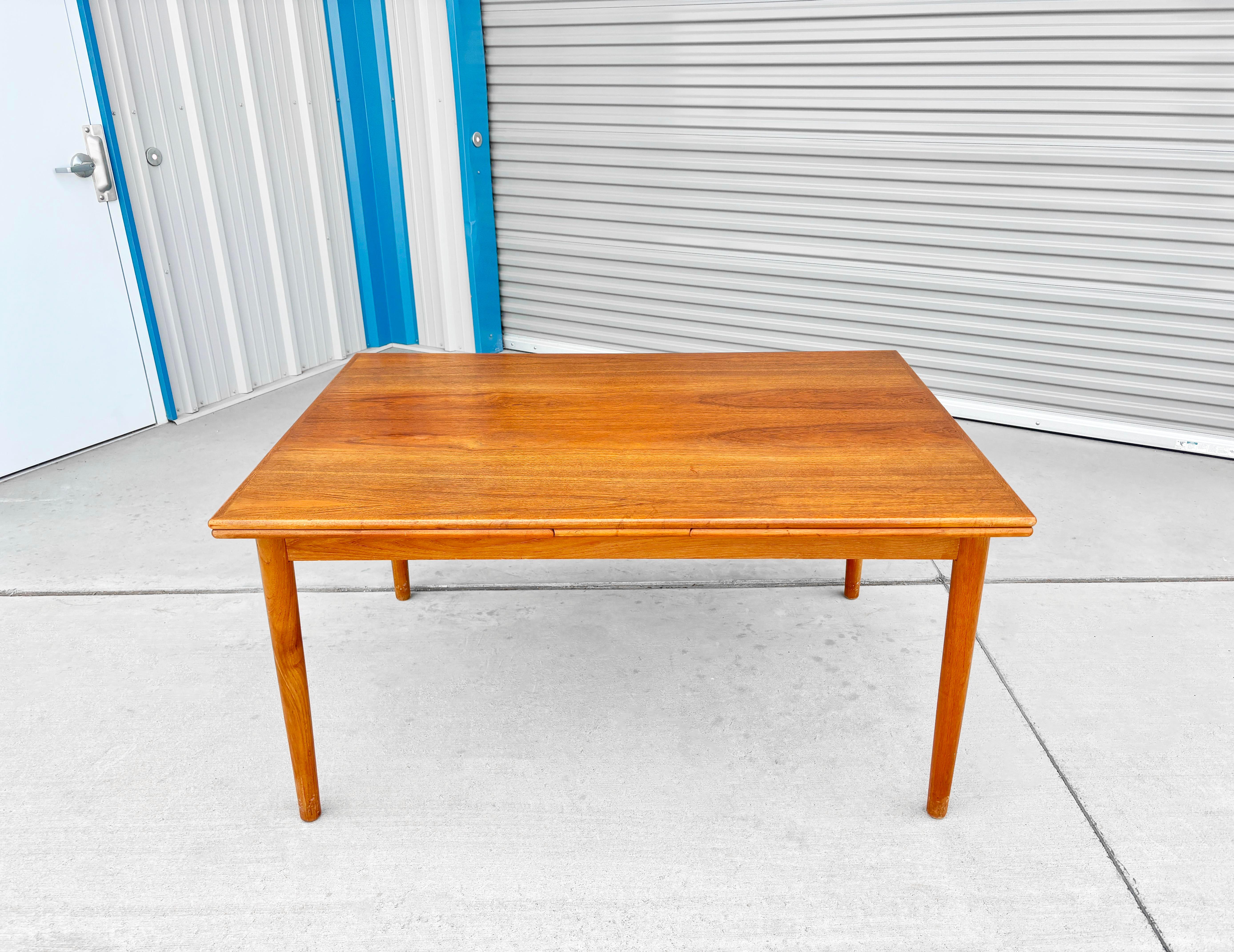 Mid-Century Modern 1960s Danish Modern Teak Extendable Dining Table For Sale