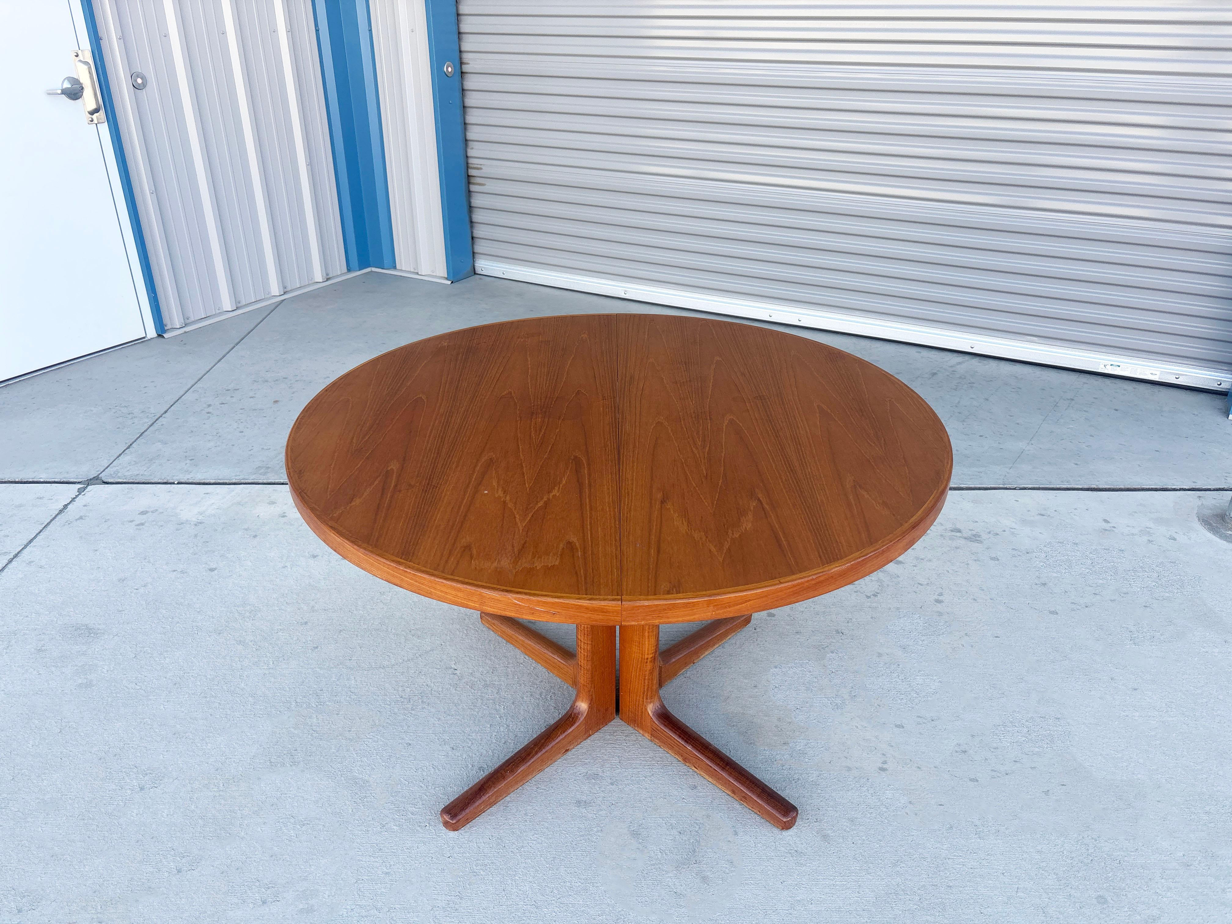 Mid-Century Modern 1960s Danish Modern Teak Extendable Dining Table For Sale