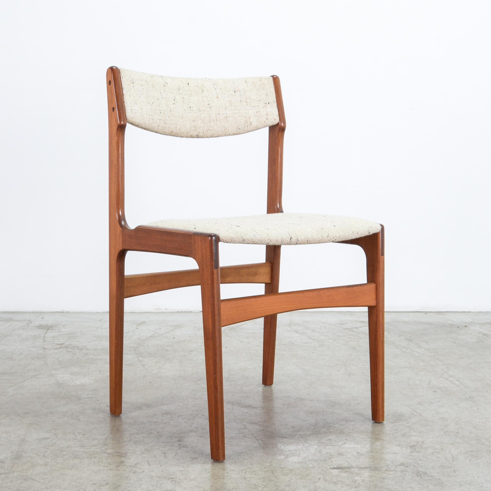 From Denmark circa 1960, these simple and finely crafted chairs are sleek and inviting. Updated with a cotton-linen-polyester upholstery fabric, with great natural texture and easily cleaned. A characteristic mid-20th century design features clean