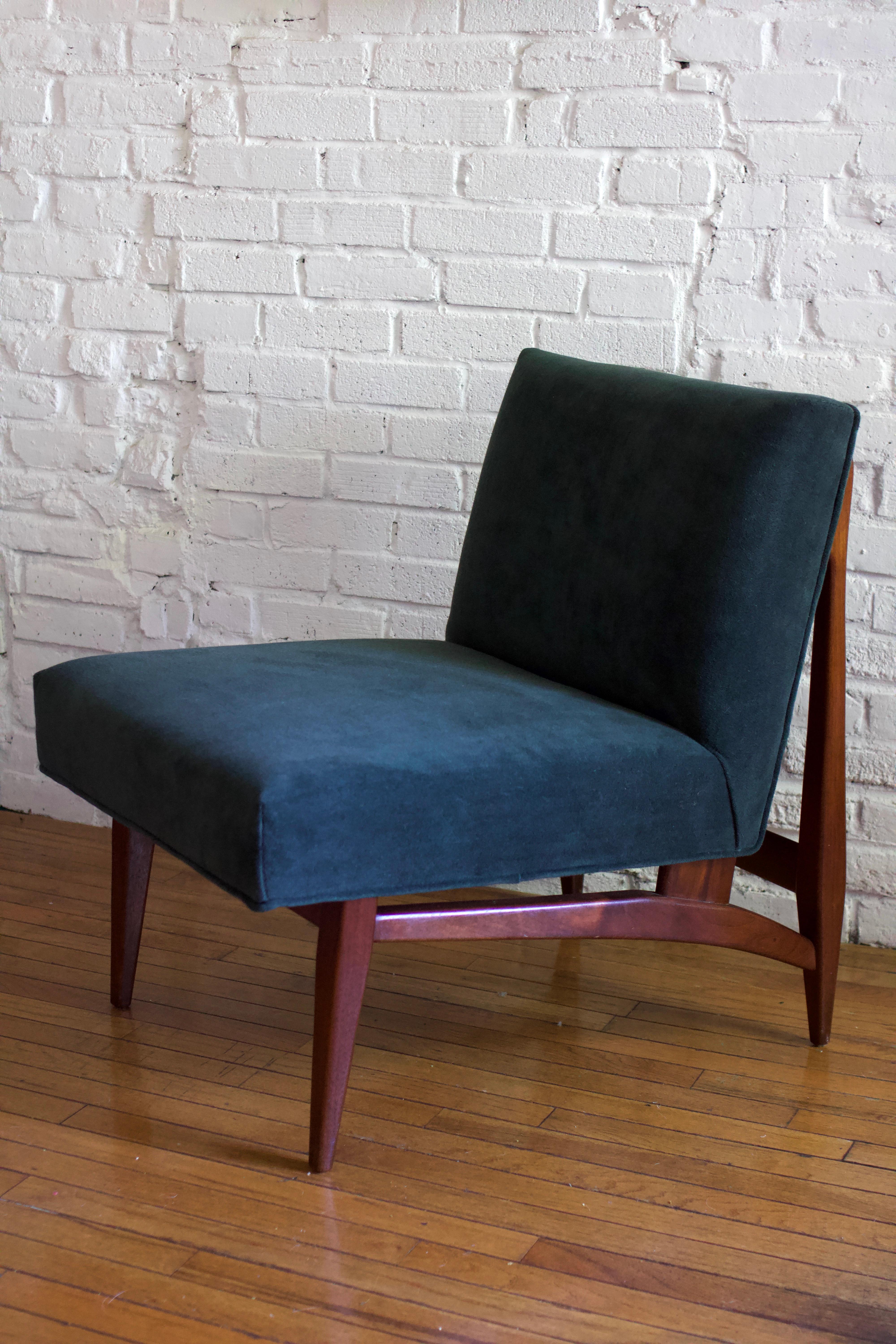 Stunning 1960's Danish armless slipper chair. Thoughtfully reupholstered with supple green mohair velvet. Oak frame was recently restored as well. The chair's elegantly sculpted legs and back frame along with its rich, wood tone make this chair