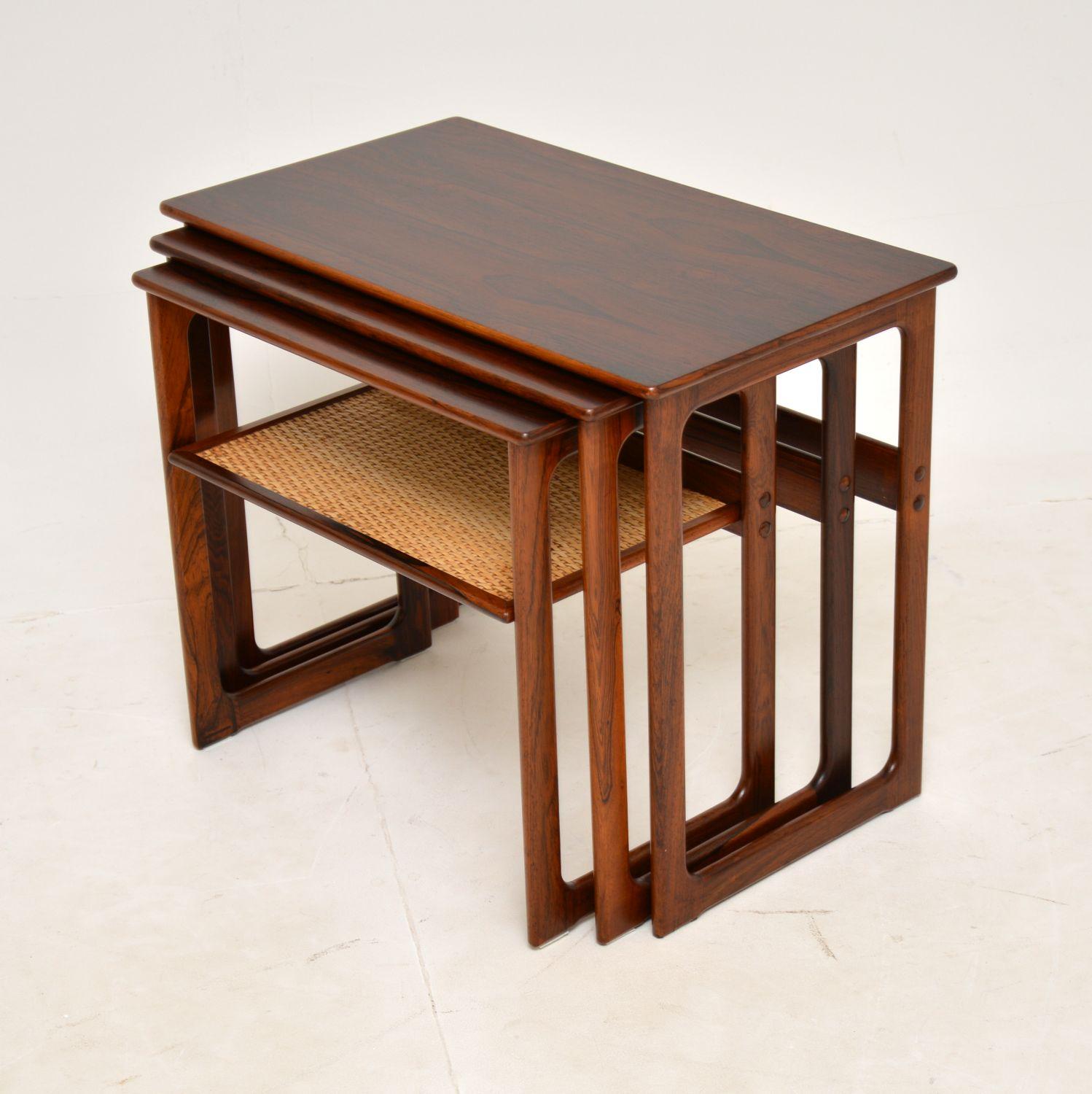 A stylish and extremely well made Danish nest of tables. These were designed by Johannes Andersen for Silkeborg, they date from the 1960’s.

The quality is amazing, these have a gorgeous and very practical design. The wood has a beautiful colour and