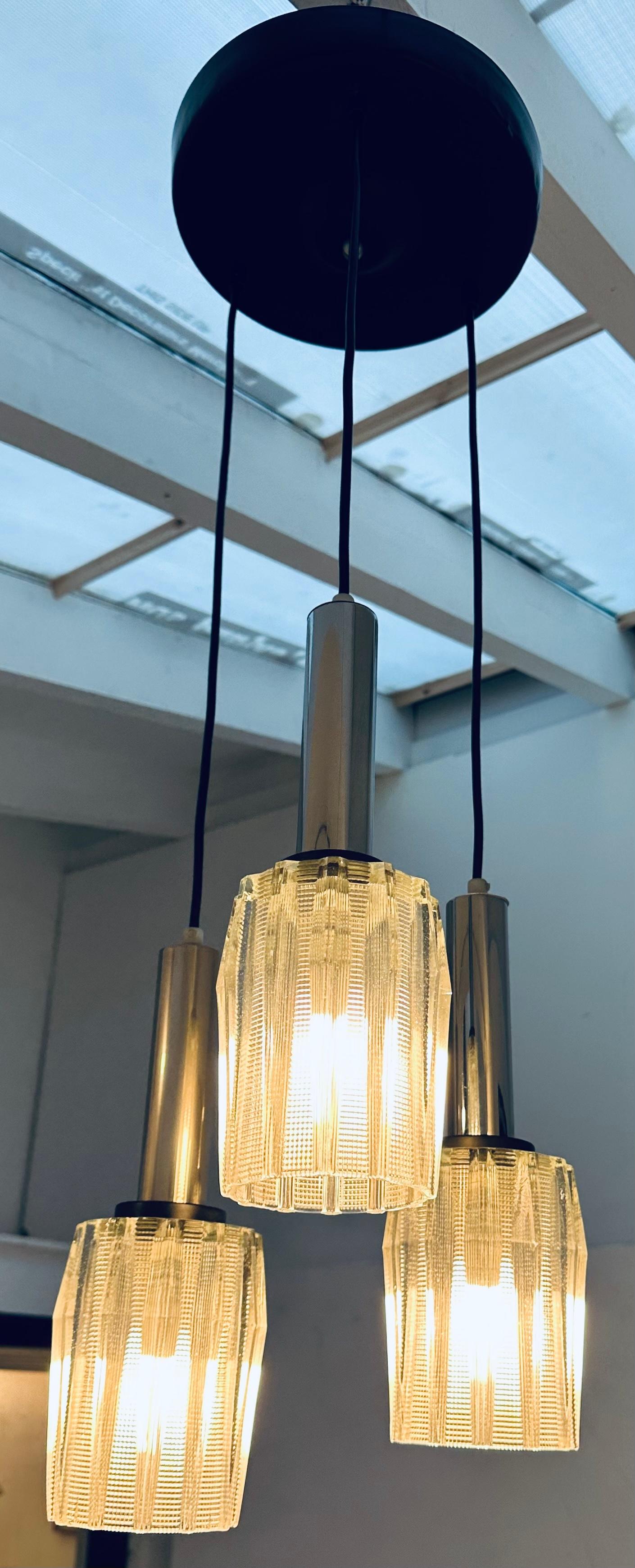 1960s Danish Polished Chrome and Serrated Glass 3-Shade Ceiling Hanging Light In Good Condition In London, GB