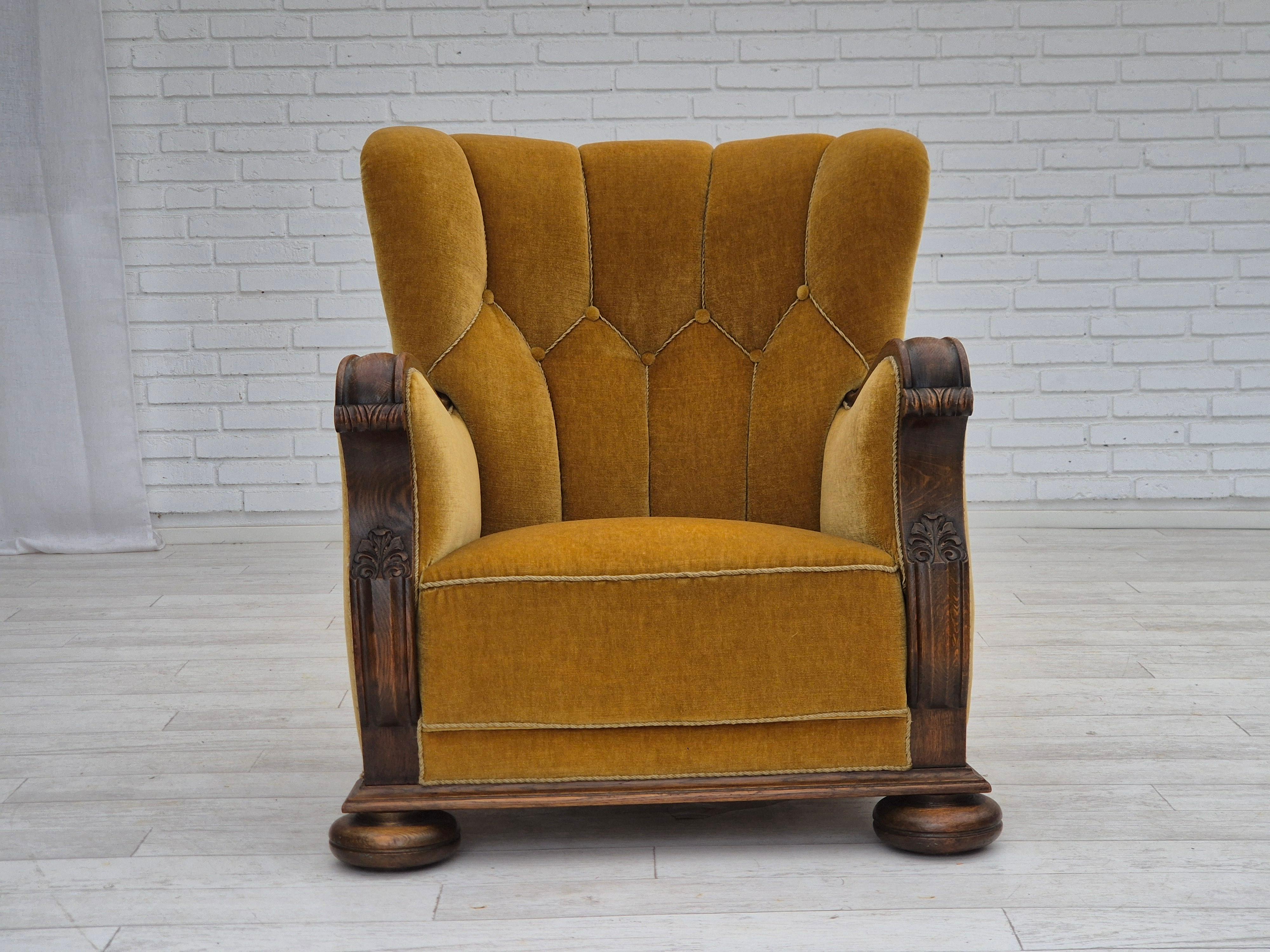 1960s, Danish relax armchair. Yellow-honning furniture velour, oak wood legs and armrests, brass springs in the seat. Original very good condition: no smells, no stains and stable construction, new belts under the seat. Manufactured by Danish