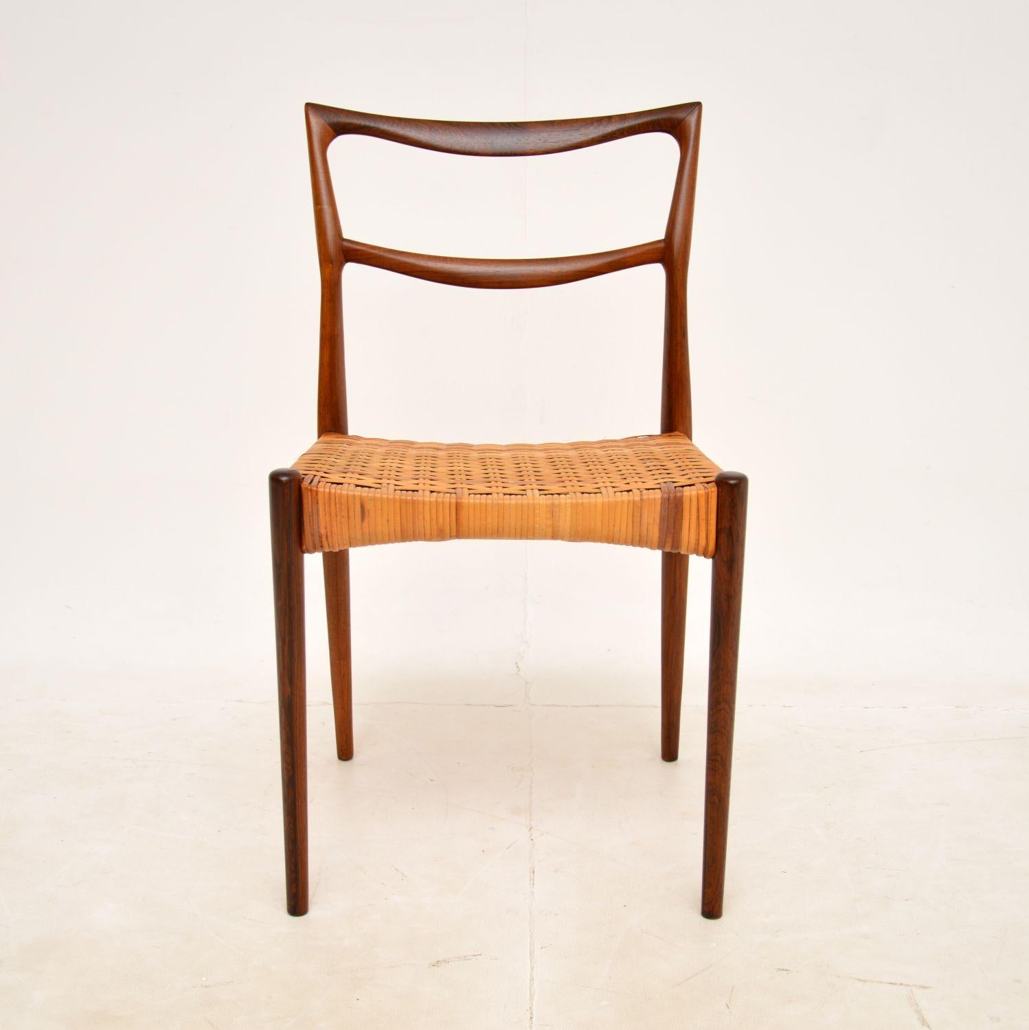 A stylish and very rare vintage Danish chair. This was made in Denmark in the 1960’s, it was designed by NA Jorgensen.

The quality is amazing, this has a fine and elegant design. The grain patterns are gorgeous, this has a wonderful colour