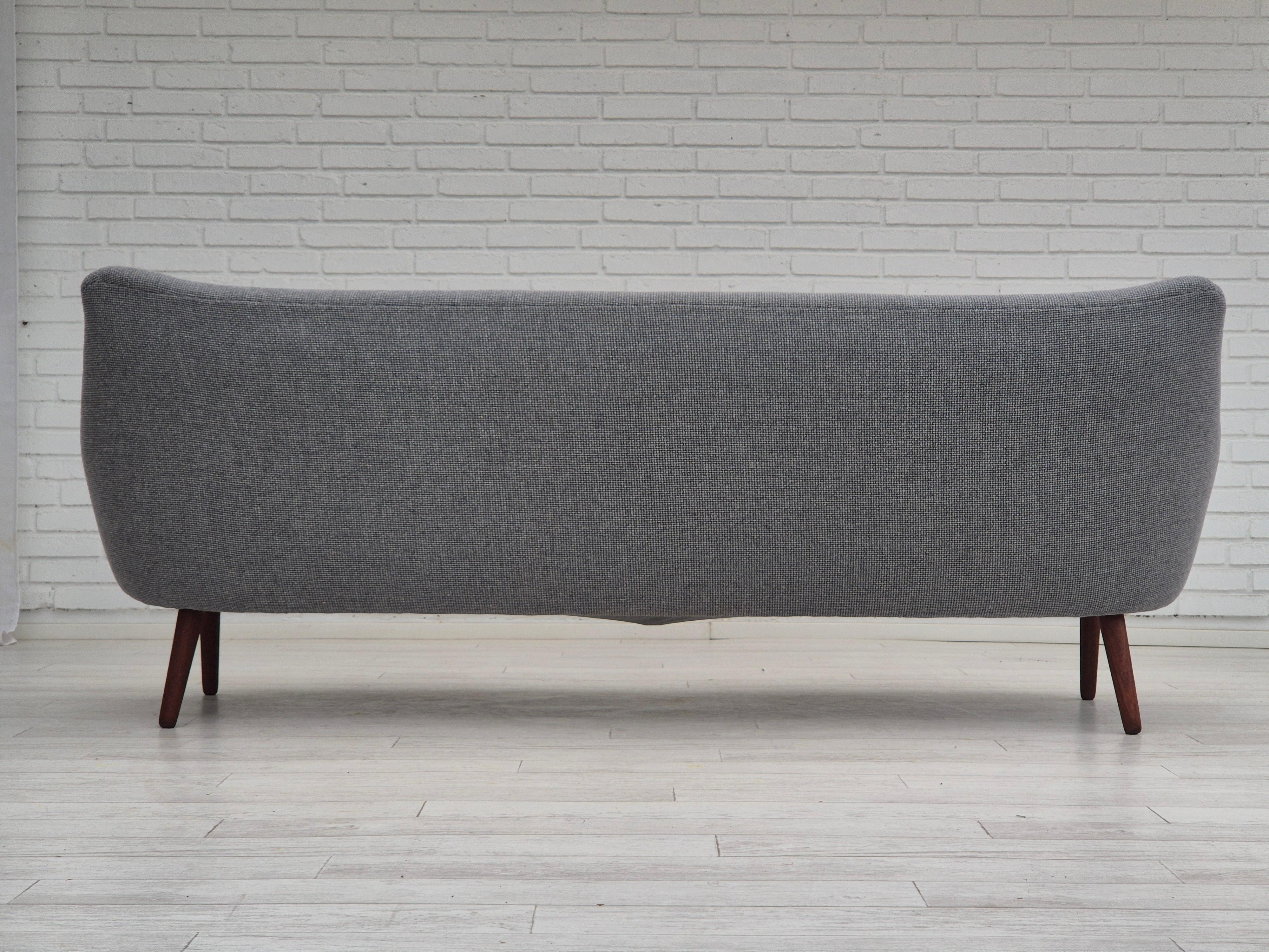 Mid-20th Century 1960s, Danish sofa by Kurt Østervig model 58, completely reupholstered. For Sale