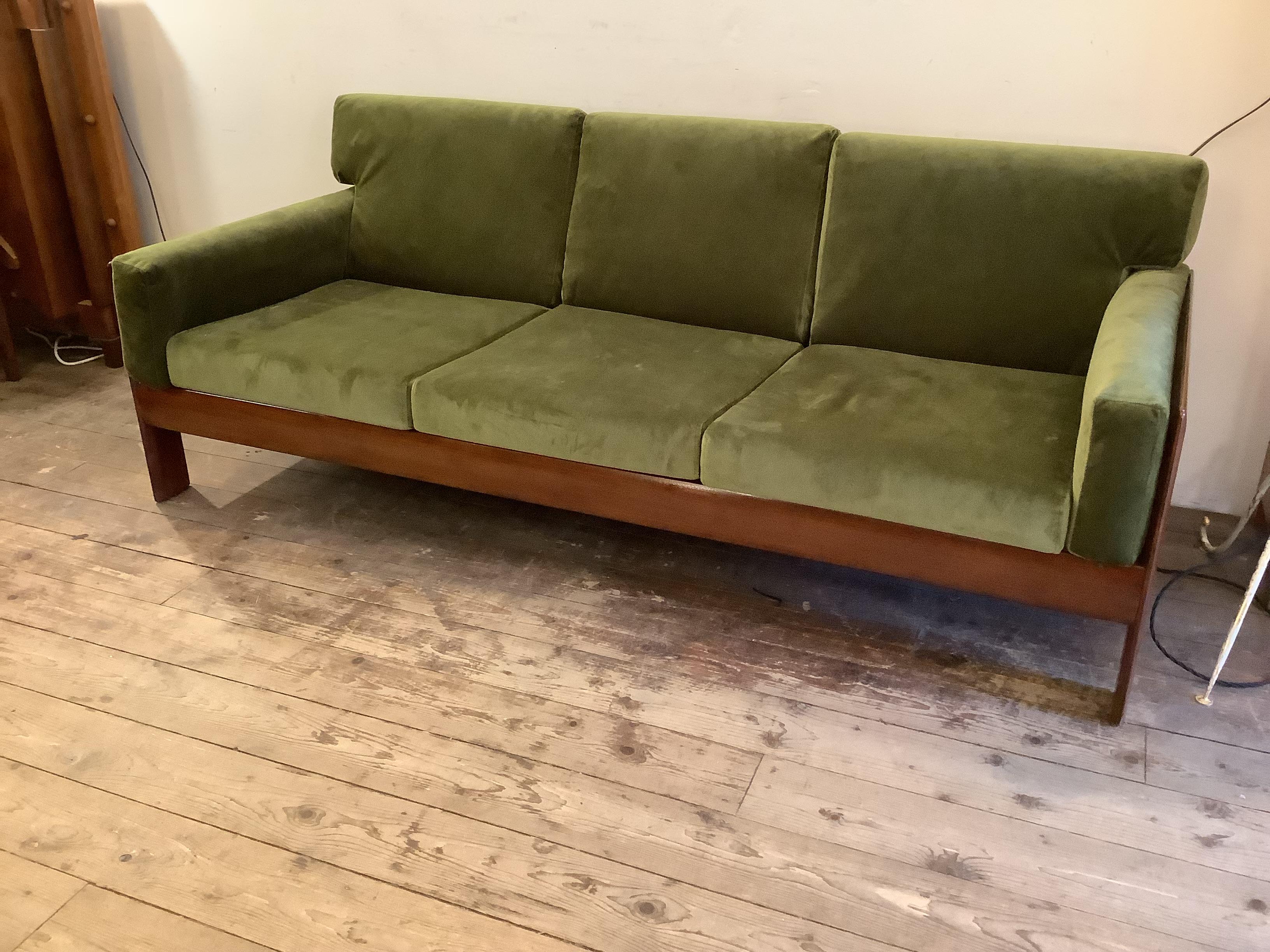 Superbly designed Danish 3 seater sofa restored with green velvet reupholstered .Teak frame polished 