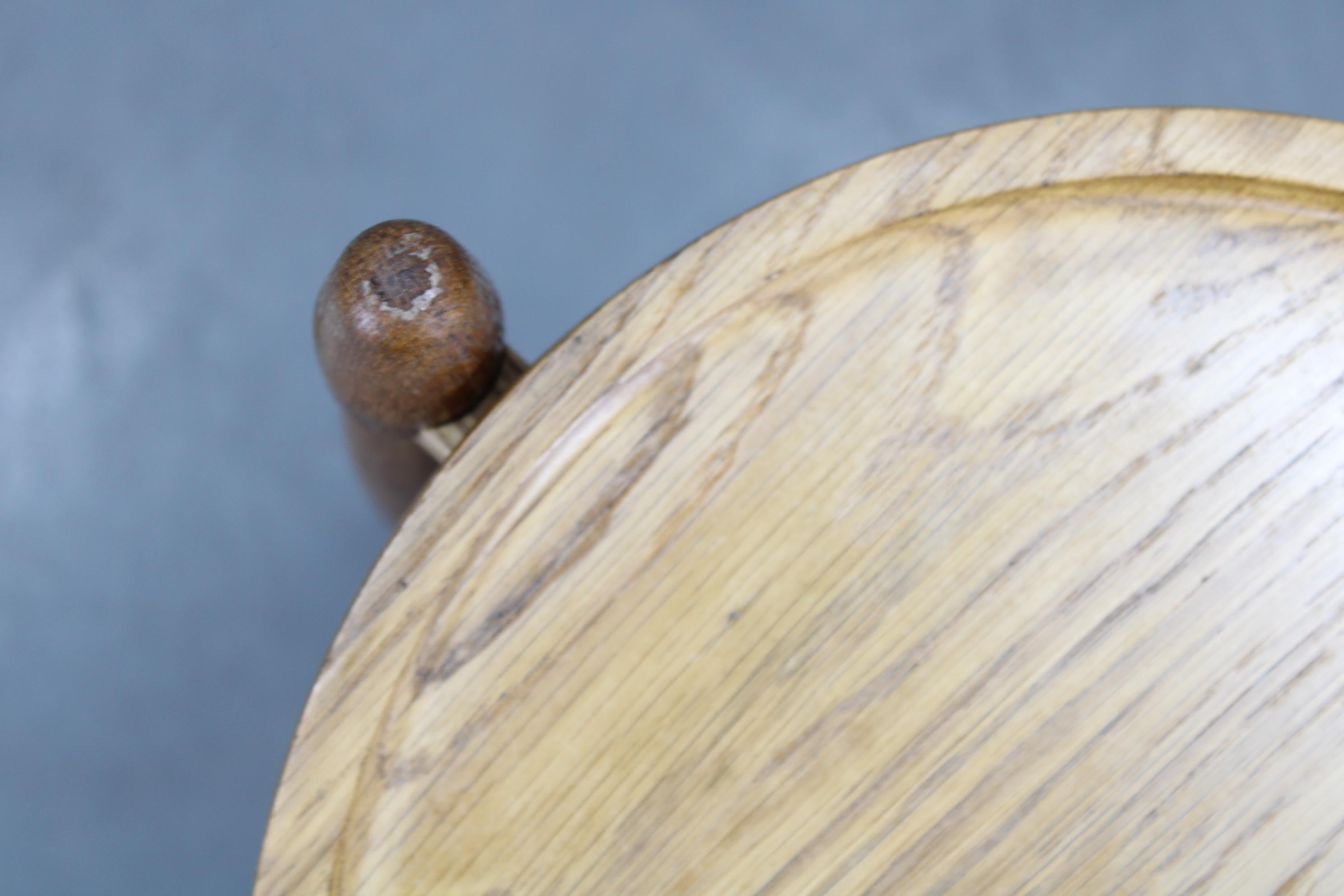  Rare solid oak side table designed by Arne Basse for Knabstrup, Denmark, in the 1960s. Showcasing timeless mid-century craftsmanship and Scandinavian design, this sturdy piece is ideal as a small accent or plant stand. 
Dimensions: Height 47 cm