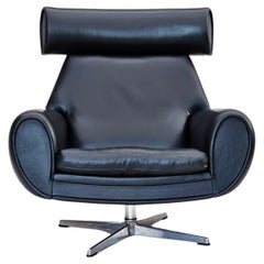 Vintage 1960s, Danish swivel chair, original condition, leather, cast aluminium.
