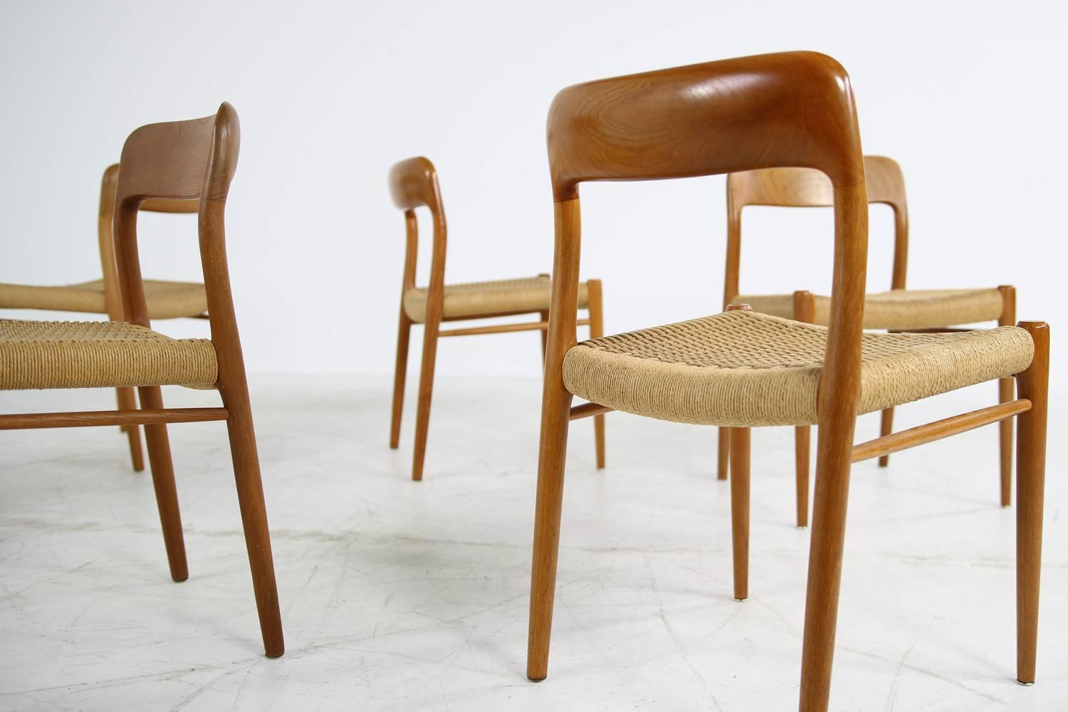 Beautiful set of six (6) dining chairs, Niels Moller Mod. 75 for J.L. Moller. Very good condition, the Danish paper cord (cane) is great, chairs are solid and the wood has fantastic patina.