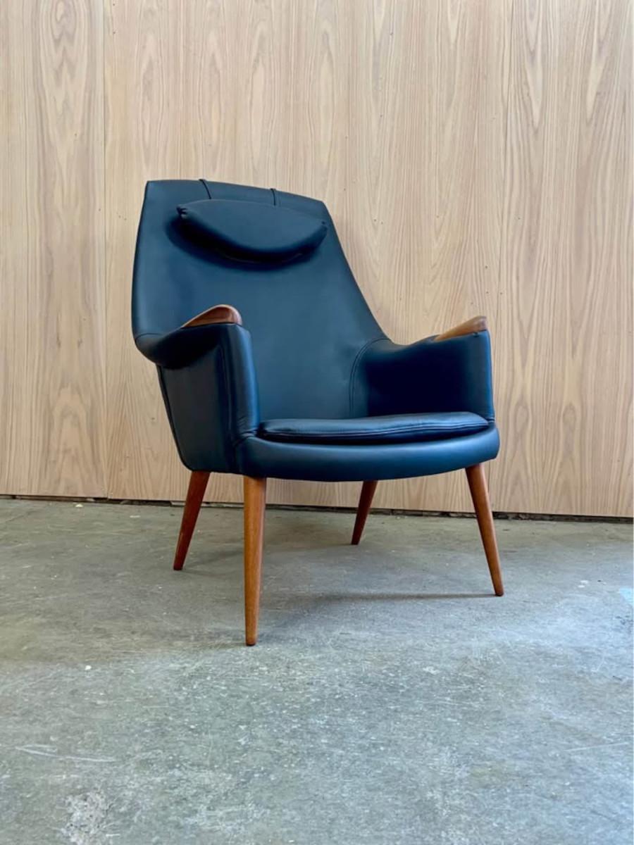 Freshly restored and ready to impress, this stunning Scandinavian lounge chair from the 1960s is a true masterpiece. Designed by Gerhard Berg, its elegant, swooping lines and timeless design exude mid-century sophistication that will captivate for
