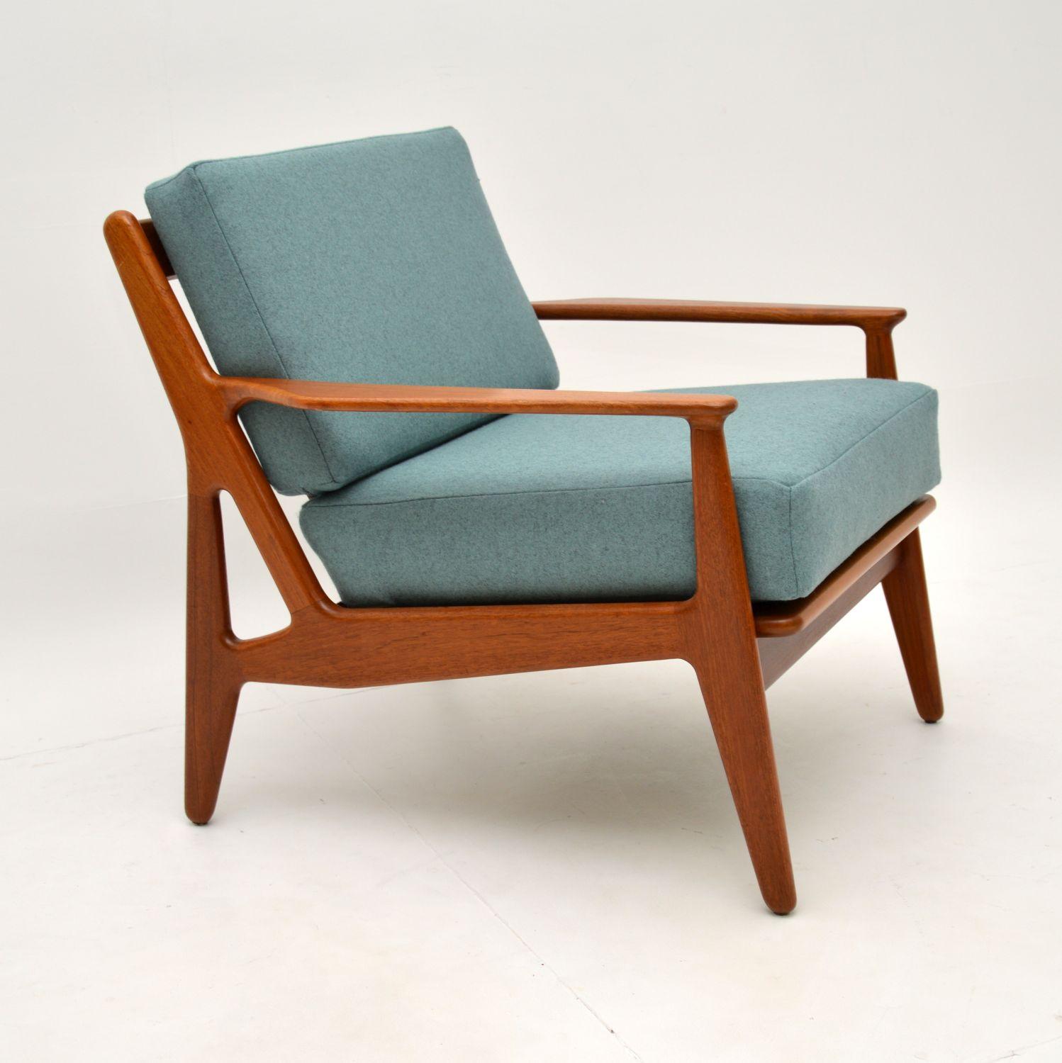 A stunning and rare Danish vintage armchair in solid teak. This was designed by Arne Vodder, it dates from the 1960’s.

We have had this fully restored, it is in amazing condition and is very comfortable.

The teak frame has been stripped and