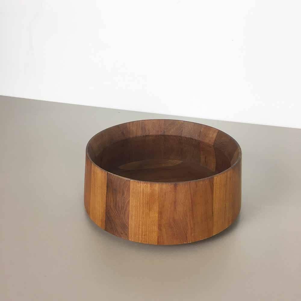 Teak bowl

by Jens Harald Quistgaard.

Producer Dansk design, Denmark,

1960s.

Original 1960s teak bowl made in Denmark. Desigend by Jens Harald Quistgaard. Made in high quality solid teak wood in diameter 30cm. The bowl is marked with the