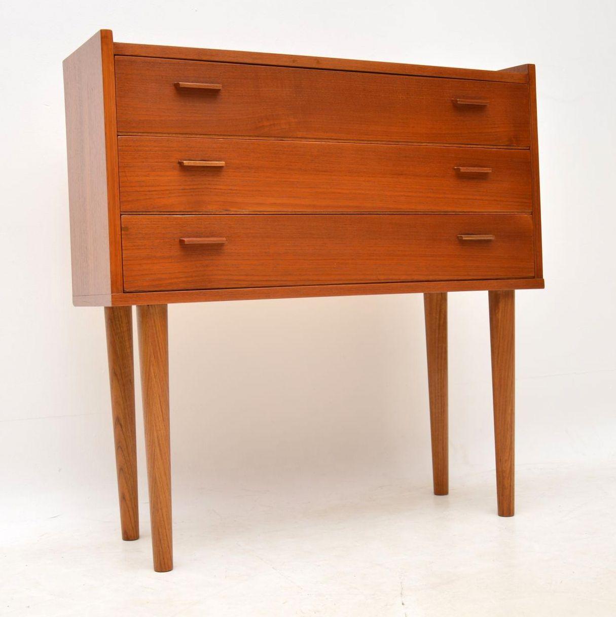 A stylish and petite Danish vintage chest of drawers in teak, this dates from the 1960s. This is in superb condition, we’ve had it stripped and re-polished to a very high standard.

Measures: Width – 76 cm, 30 inches
Depth – 28 cm, 11