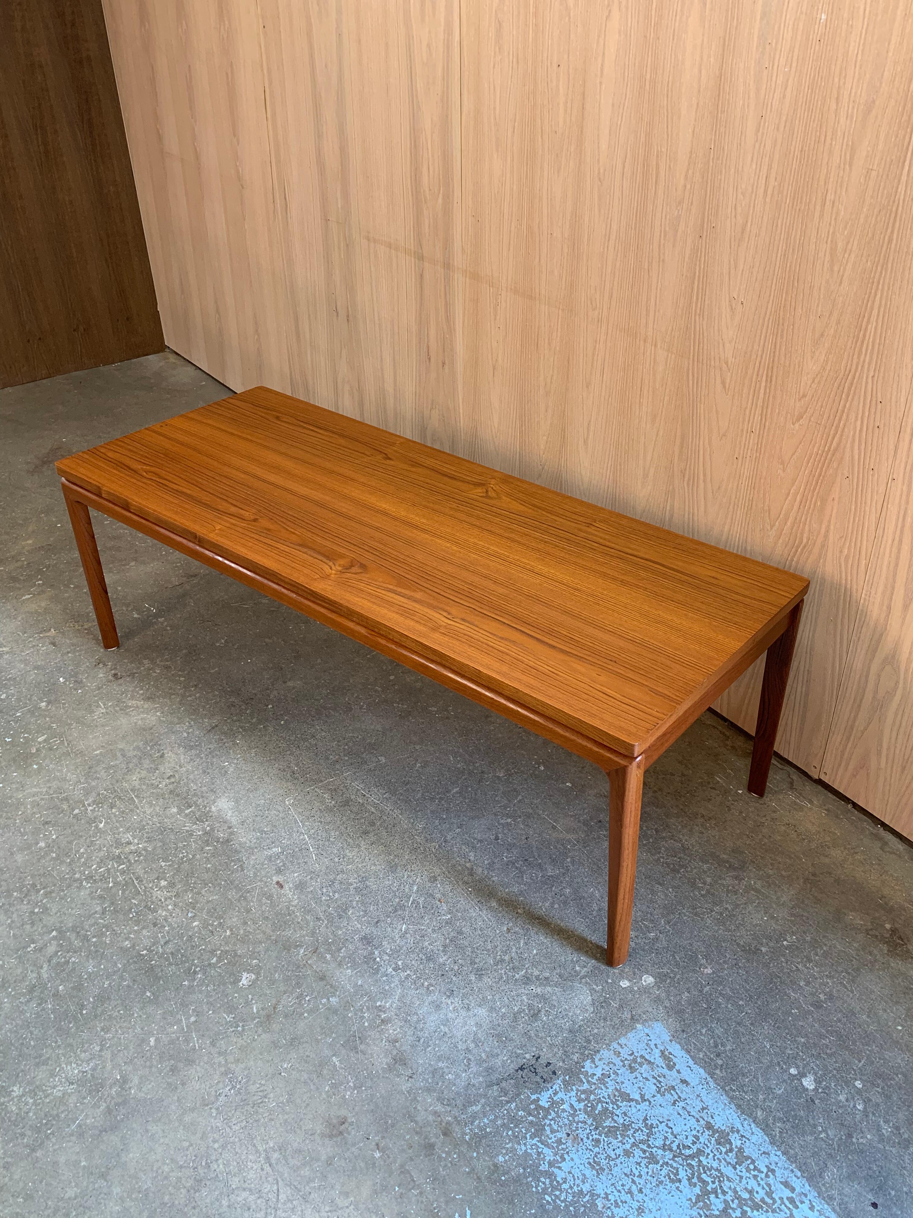 A beautiful example of refined Danish modernism, this 1960s teak coffee table by France & Son balances clean architectural lines with exquisite craftsmanship.

Freshly acquired from the original owners, the table has been gently restored by our team