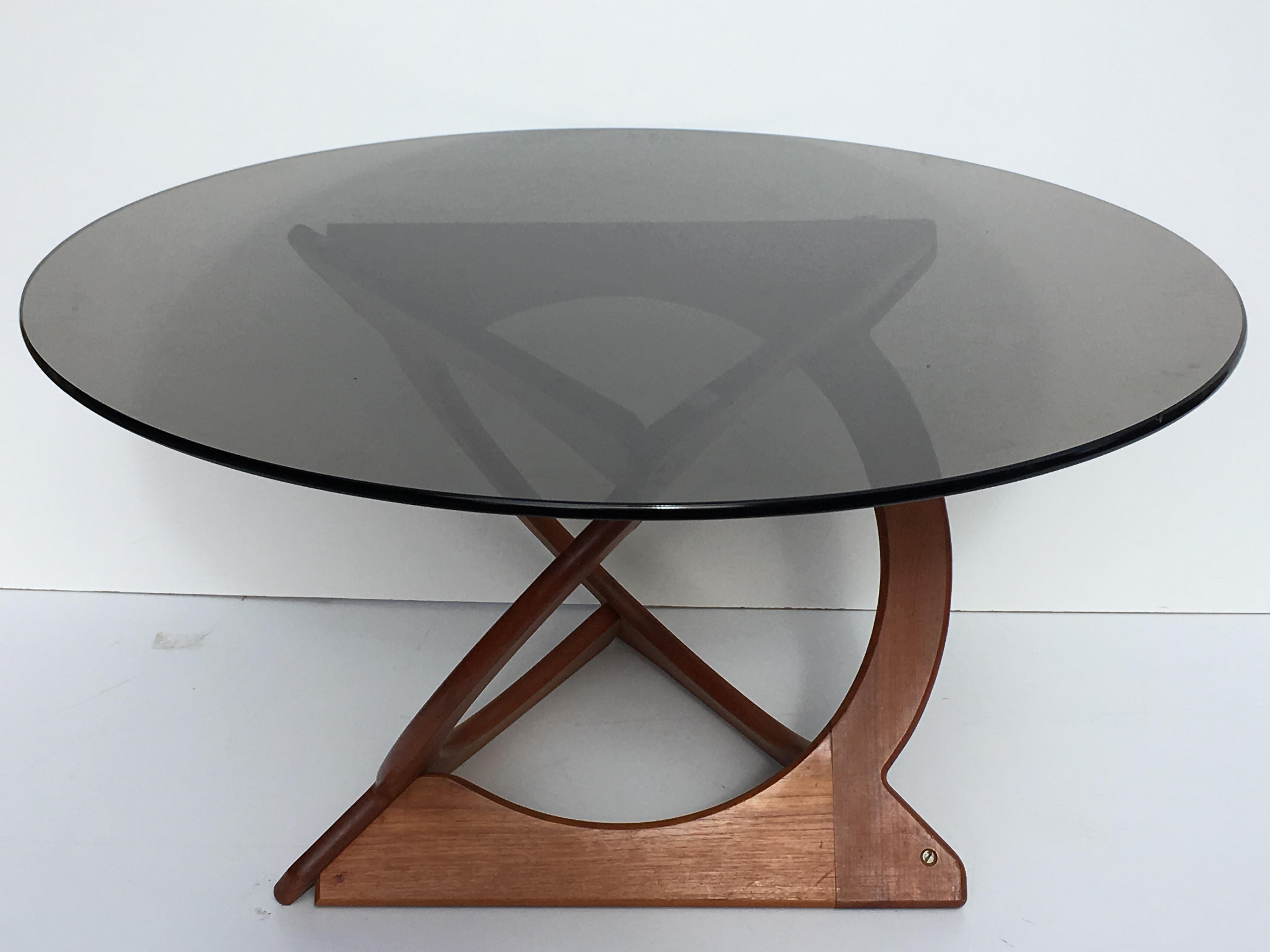 Danish teak and glass coffee table by Georg Jensen, circa 1960s. Incredible original condition.