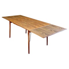 1960’s Danish Teak Draw Leaf Dining Table by Peter Hvidt