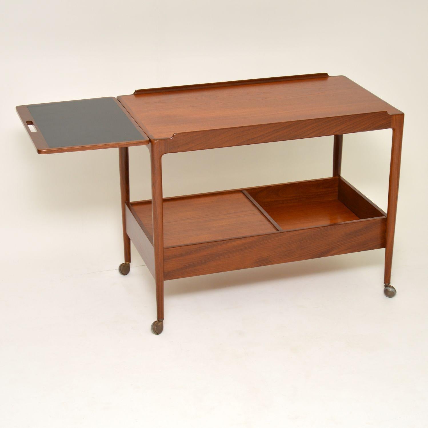 A beautiful, top quality and very rare drinks trolley in teak, this was designed by IB Kofod Larsen for the G-Plan Danish range, it dates from the 1960s. We have had this stripped and re-polished to a very high standard, the condition is superb