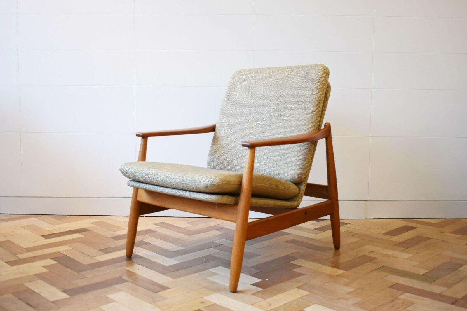 1960s Danish teak 'Easy Chair' Model 350 by Poul Volther for Frem Rojle

This 1960s armchair, designed by Poul Volther, features its original wool upholstered cushions that sit within a teakwood frame. 

A classic staple piece that encapsulates