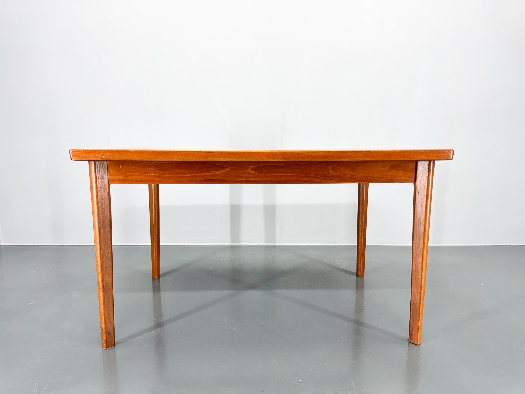 Mid Century teak wood table made in Danmark in the 1960's. Carefuly refurbished.  The table is 228 cm long when extended.