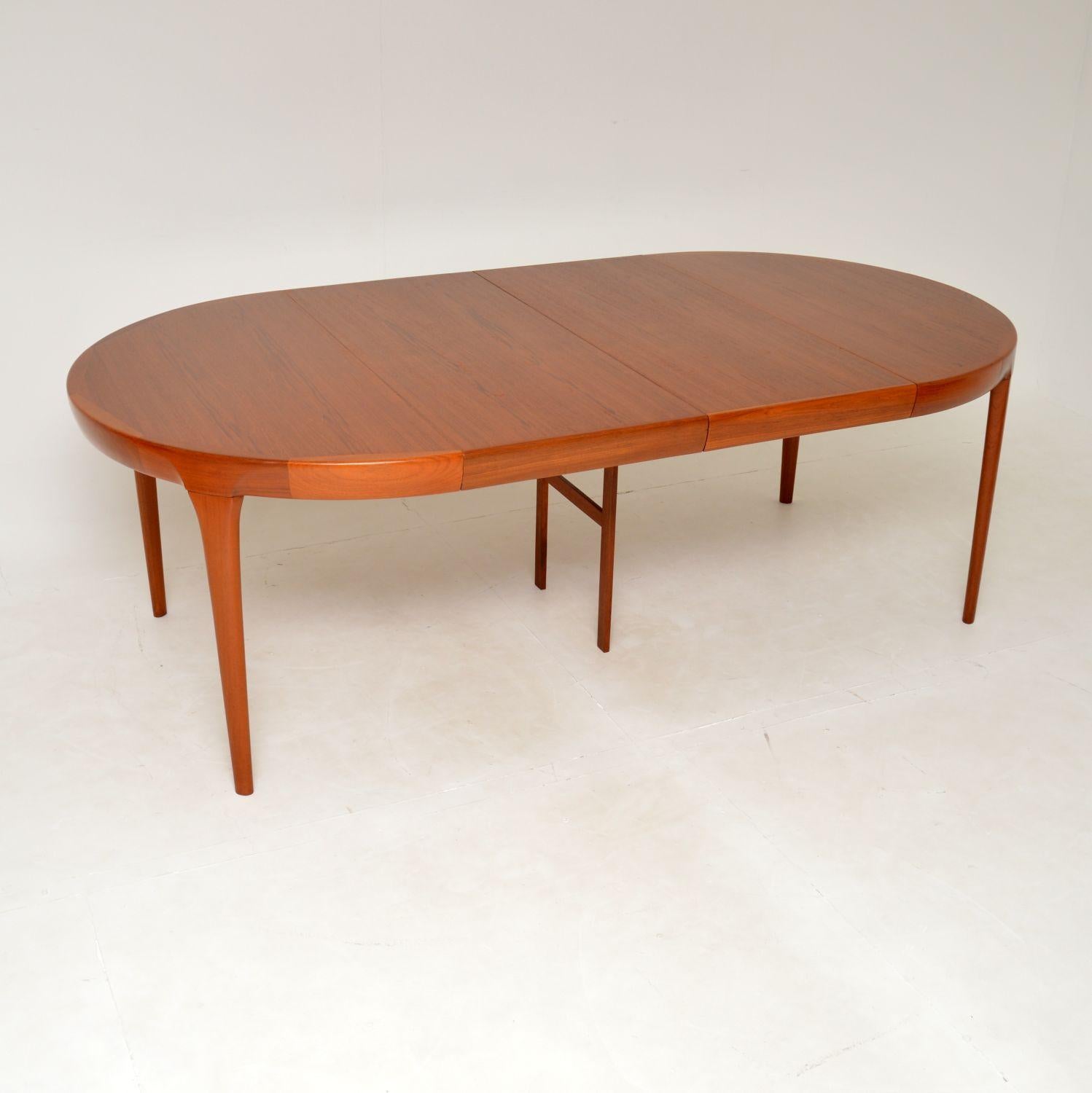 A stunning vintage Danish teak dining table of the highest quality. This was designed by IB Kofod Larsen, it was made in Denmark and dates from the 1960’s.

We have had this stripped and re-polished to a very high standard, the condition is