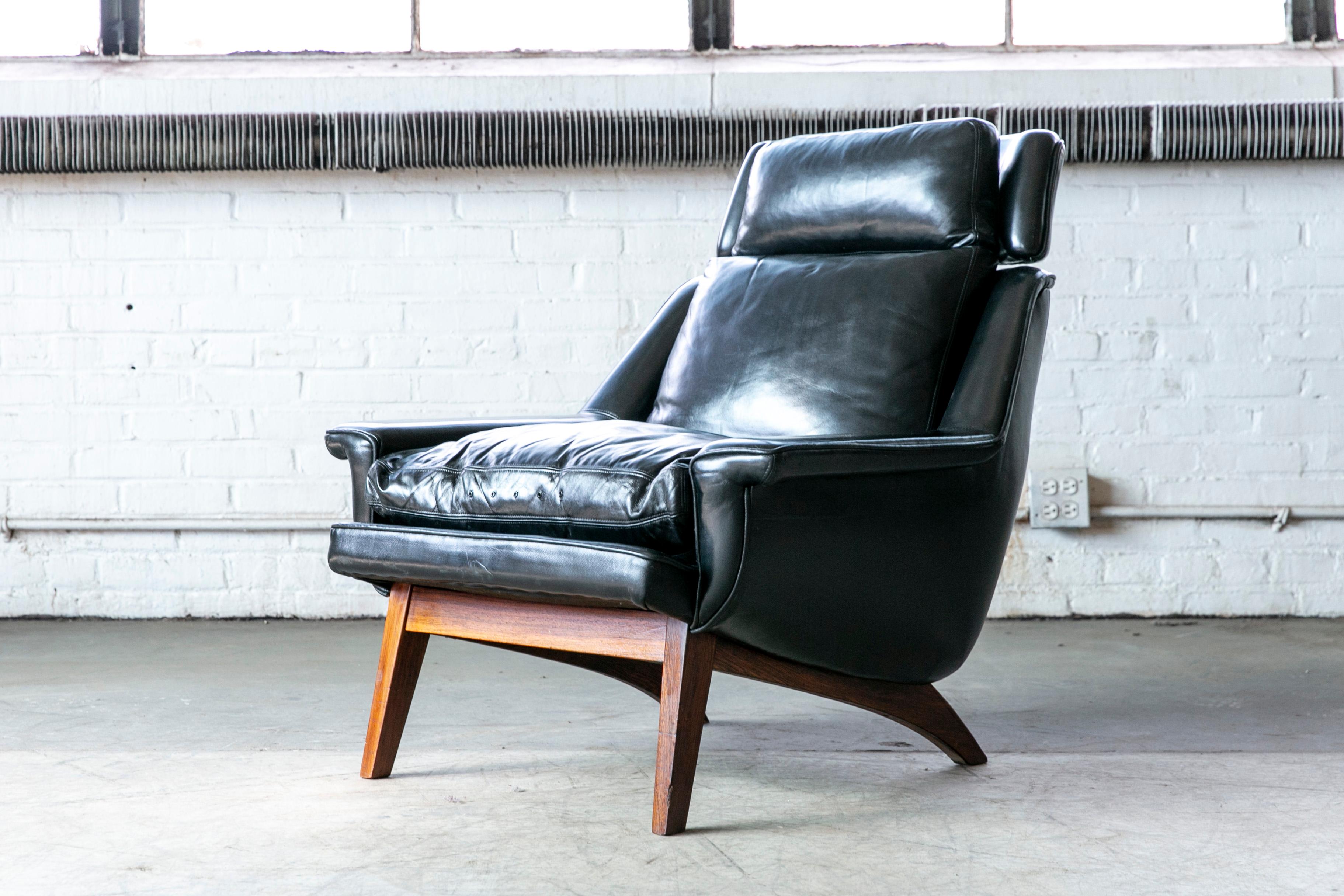 This Danish chair from the 60's is in general a rare find and even more so in this great condition. The lounge chair is from a company that was named ESA Møbelfabrik in Esbjerg Denmark and designed by an in-house 
designer named Langfeld. The