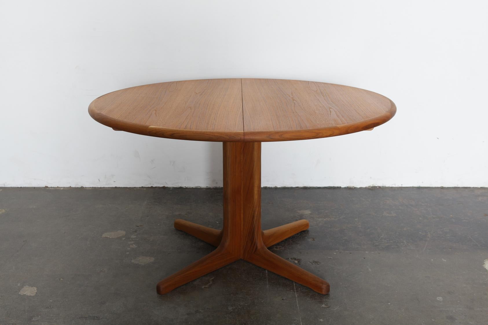 teak pedestal dining table