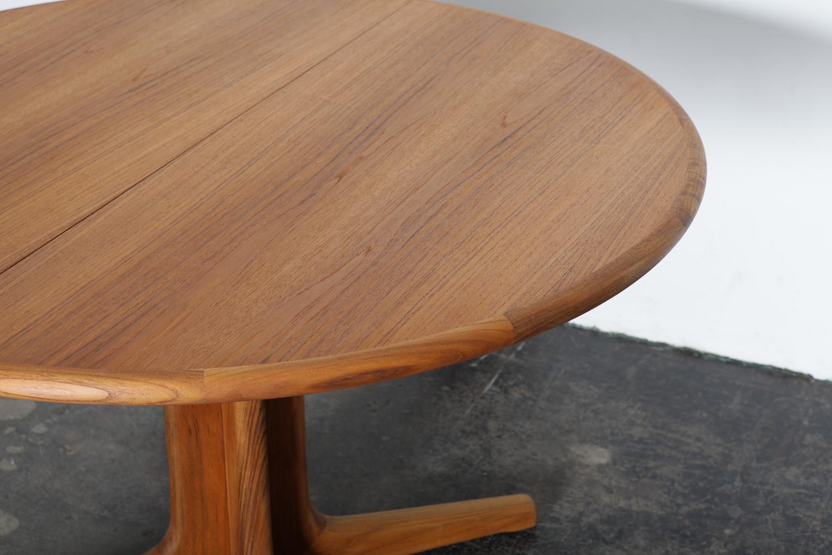 teak pedestal table