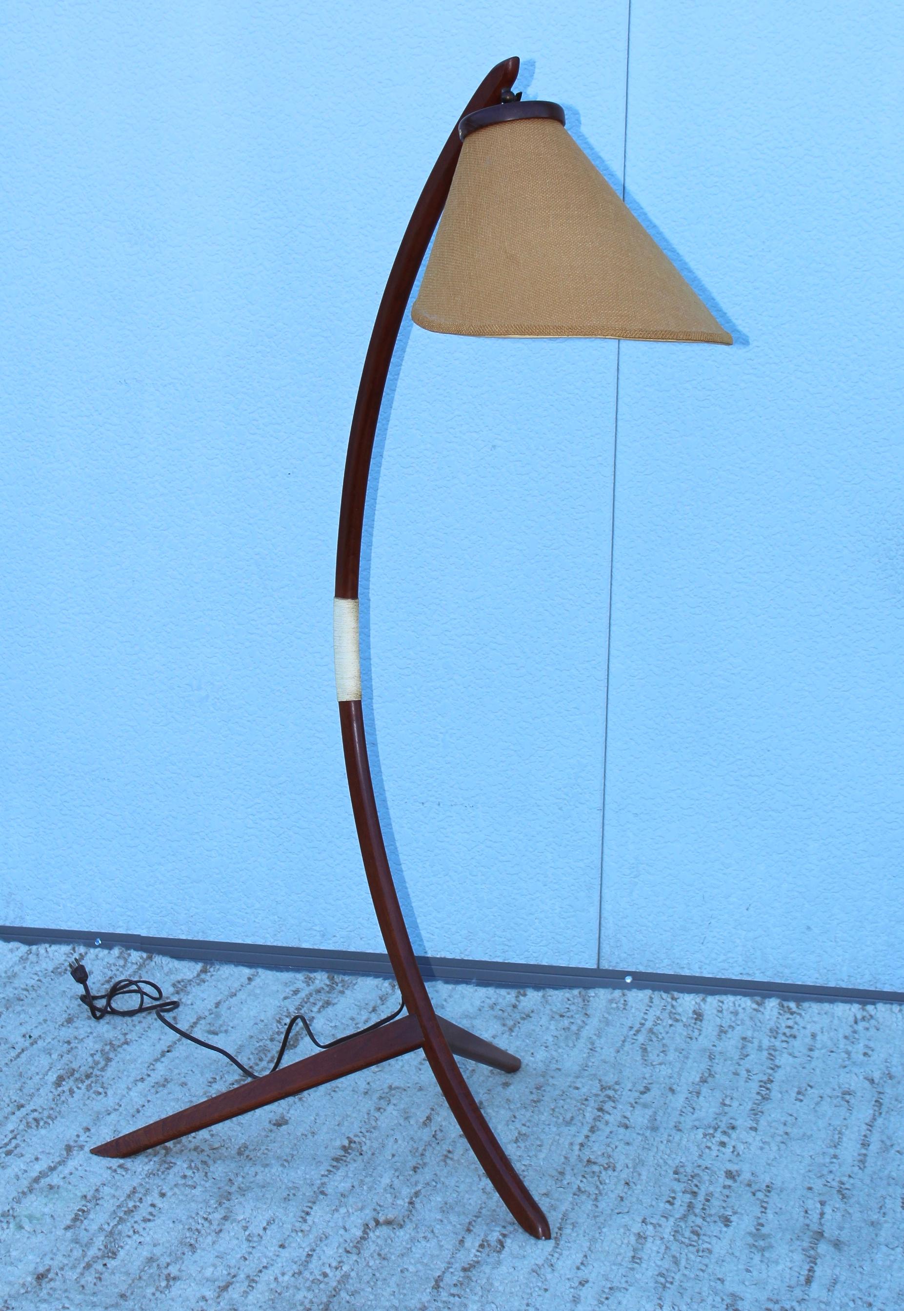 Stunning 1960's Mid-Century Modern Danish teak tripod floor lamp, in vintage original condition with original shade, there is some wear to shade and minor wear to the teak.