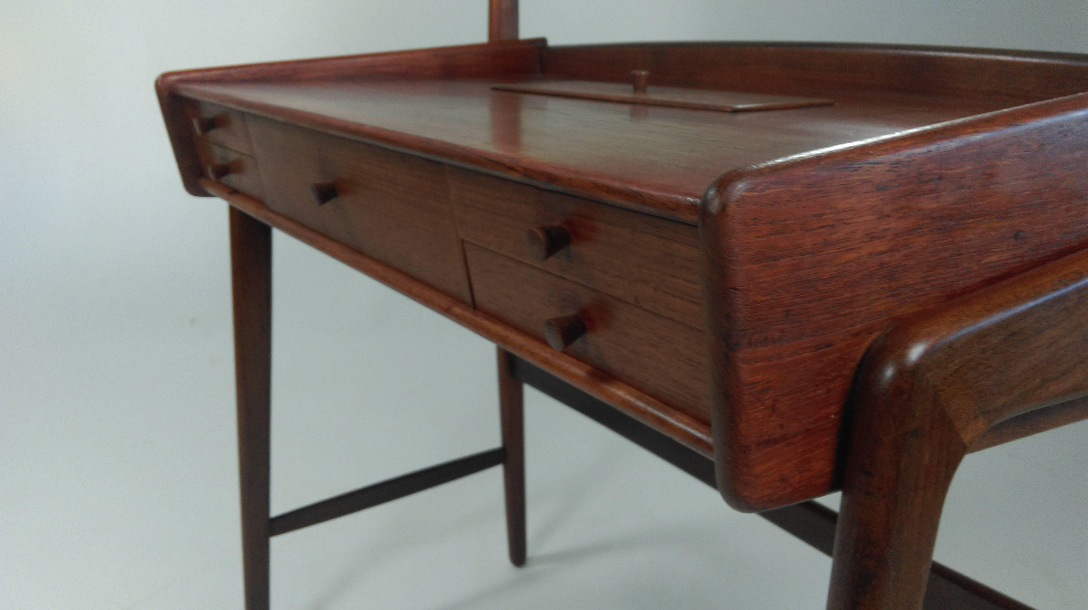 Well crafted Danish vanity or dressing table in teak from the 1960´s with small drawers for your vanity accessories. Designed by Svend Aage Madsen.

The table has been overlooked and refinished by cabinetmaker and is in good condition.