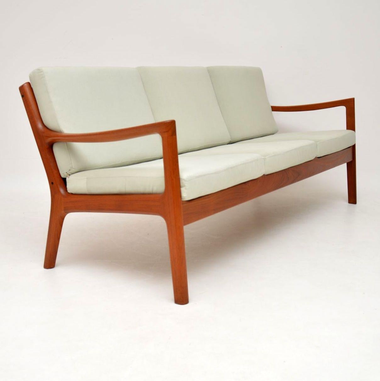 A stunning Danish sofa in solid teak, this model is called the ‘Senator’, it was designed by Ole Wanscher and was made by Cado in the 1960s-1970s. It’s in excellent condition for it’s age, the teak frame is clean, sturdy and sound, with only some