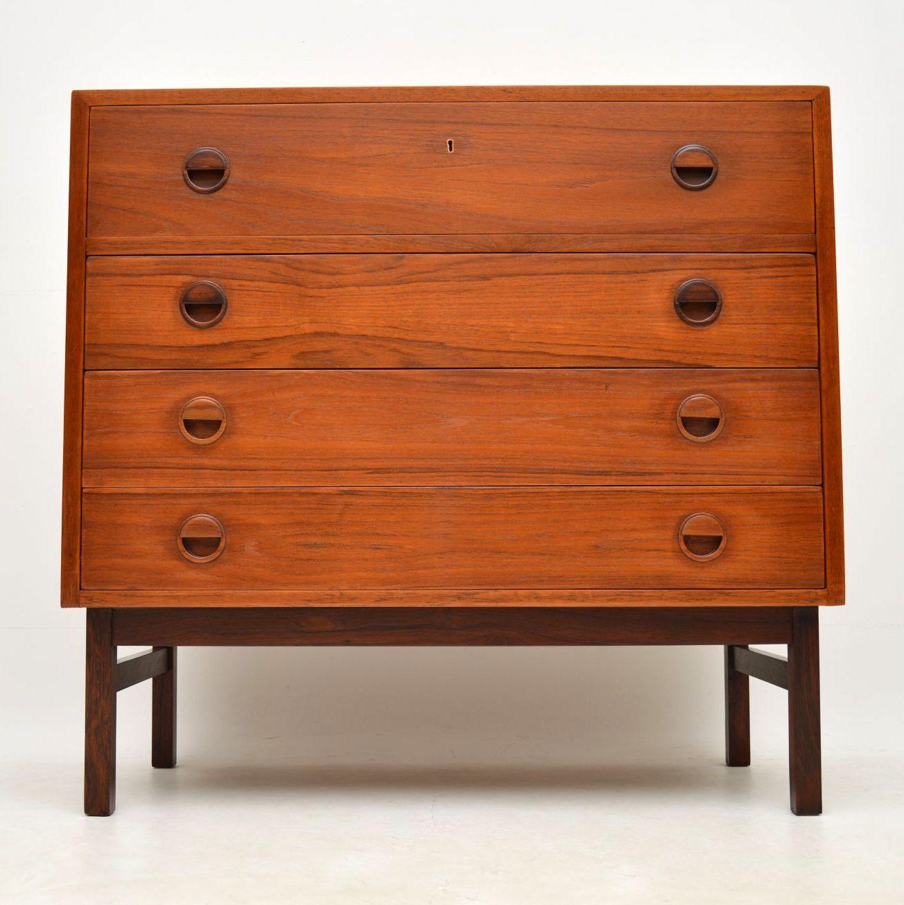 A stunning and unusual design, this vintage Danish chest from the 1960s has a built in secretaire bureau in the top drawer. It’s made from a combination of teak and wood. The quality is amazing and we have had this stripped and re-polished to a very