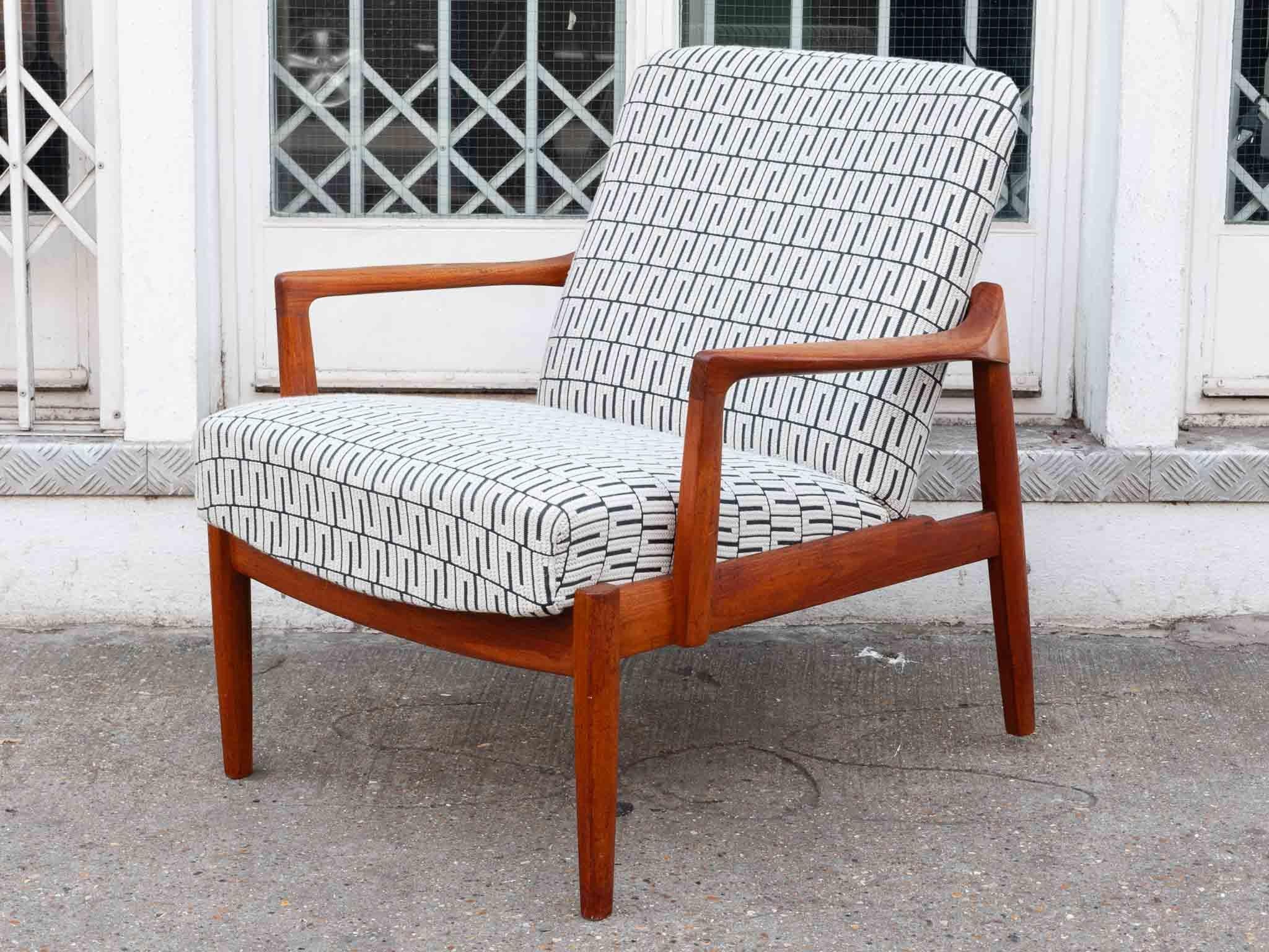 Rare Danish 1960s teak armchair designed by Tove and Edvard Kindt-Larsen for France & Son. A wonderful Danish design with beautiful lines, high legs and open-arms and back. The feature wood-joints which are visible on the back add additional