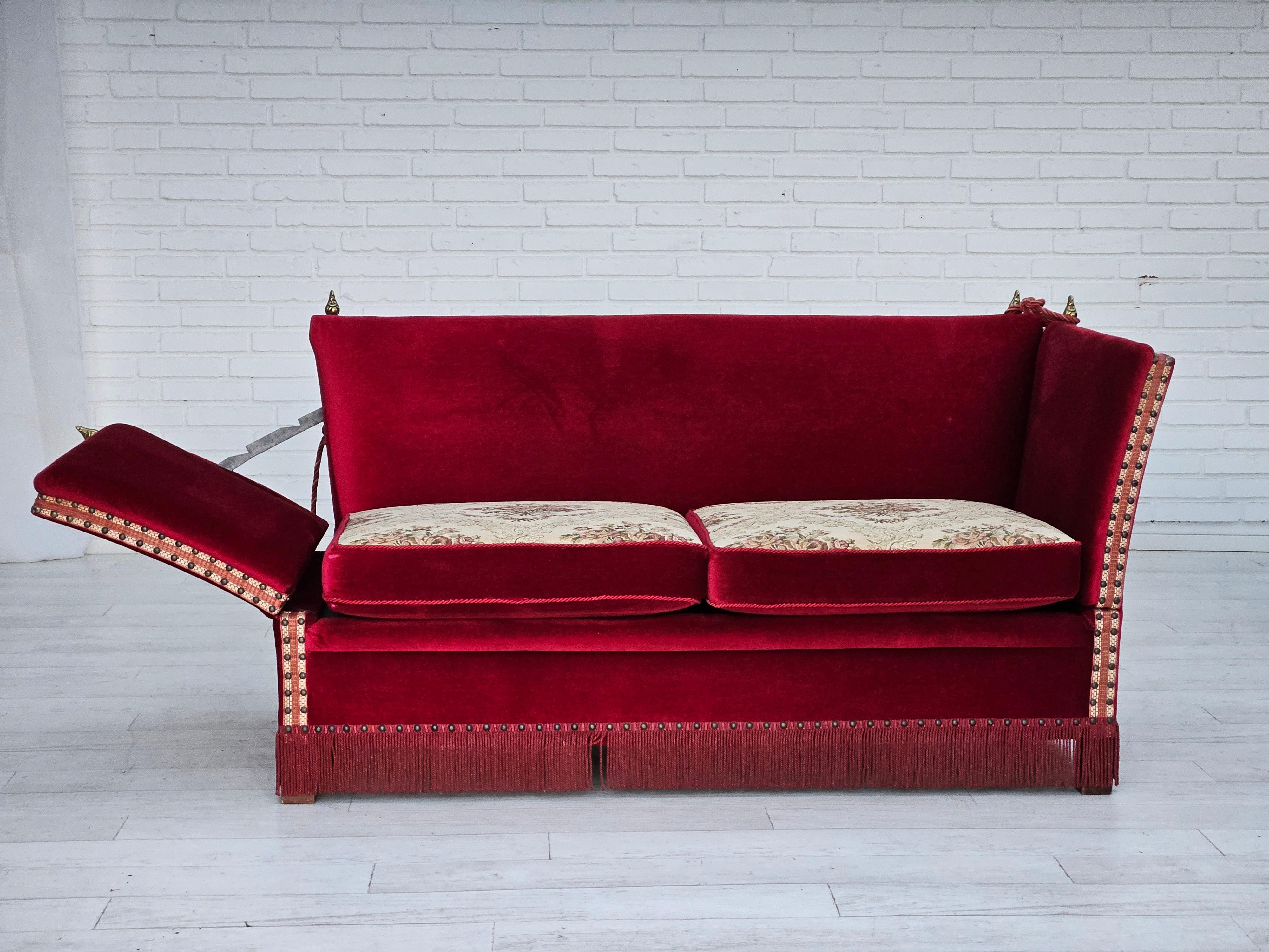 1960s, Danish drop-arm 2 seater sofa in original very good condition: no smells and no stains. Cherry-red velour. Removable double-sided (two different fabrics) seat cushions. Manufactured by Danish furniture manufacturer in about 1960s. Three