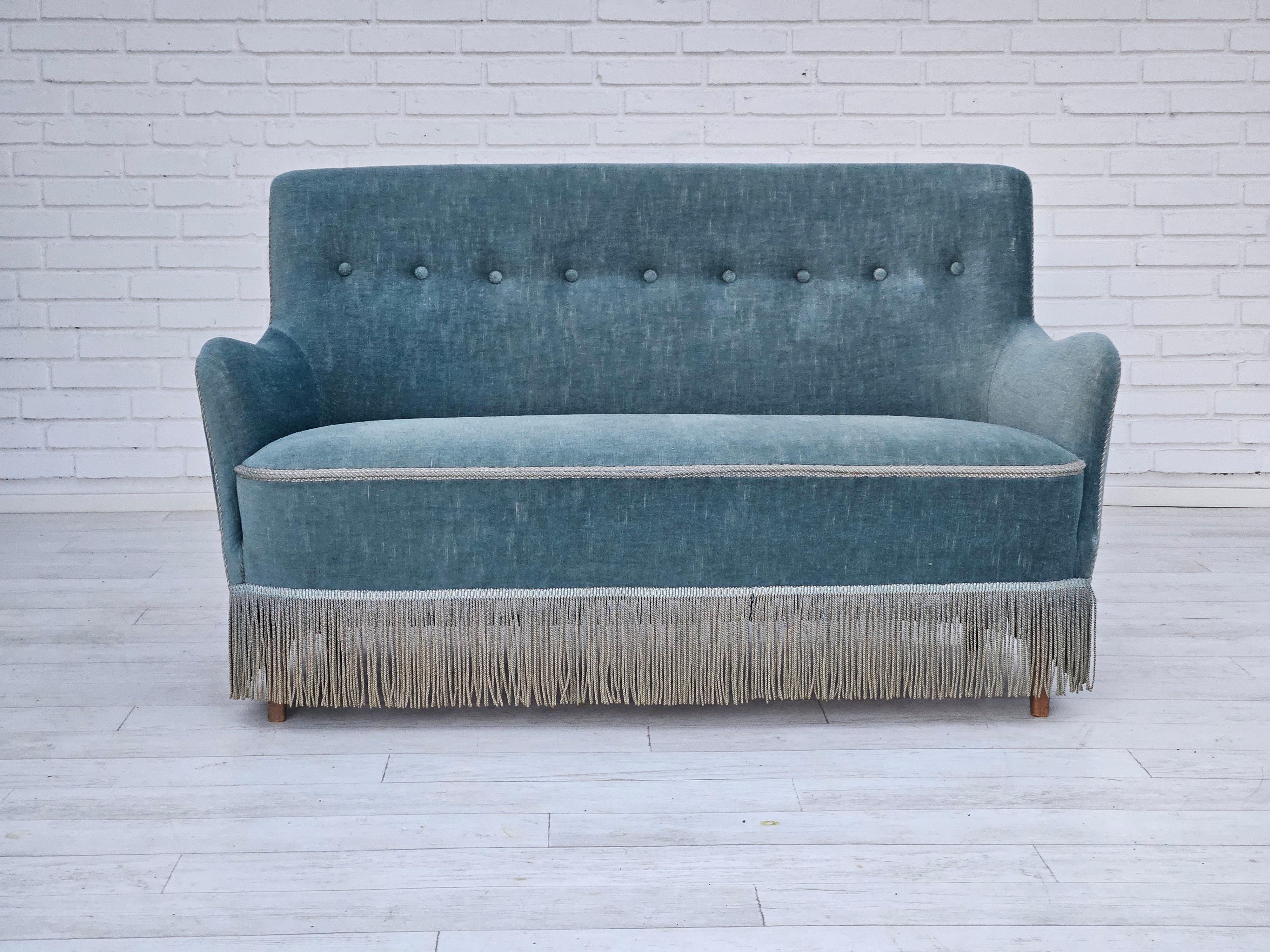 1960s, Danish 2 seater sofa in original light blue velour. No smells and no stains. Beech wood legs, brass springs in the seat. Manufactured by Danish furniture manufacturer in about 1960-65.