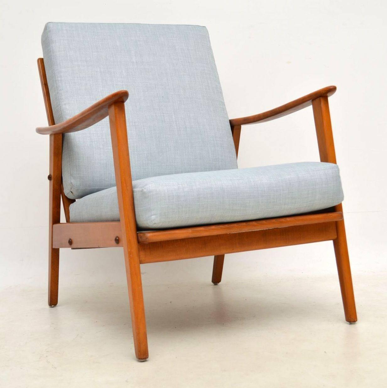 A beautifully styled and very comfortable vintage Danish armchair, this dates from the 1960s. It’s in great condition for its age, the frame is clean, sturdy and sound, with only some extremely minor wear. We have had the cushions newly made and