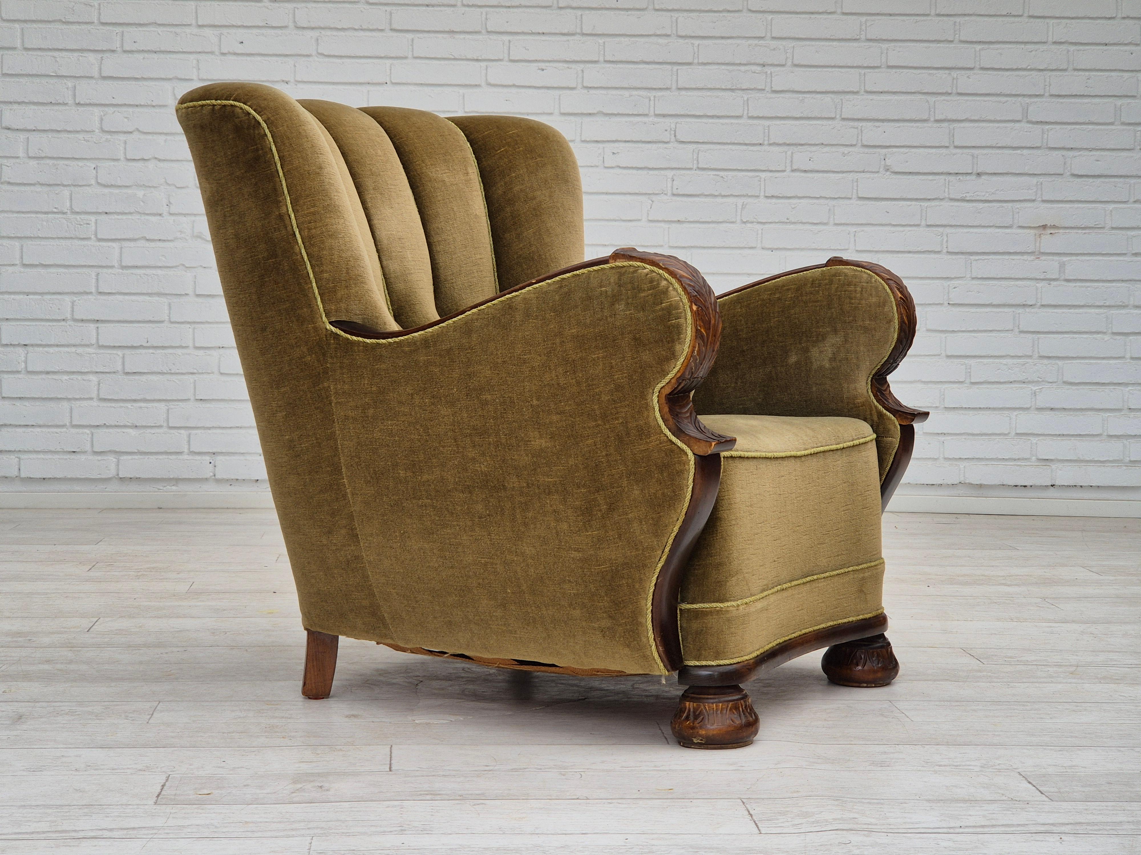 1960s, Danish armchair in original good condition: no smells, no stains, stable construction. Original green furniture velour, dark beech wood. Brass springs in the seat. Manufactured by Danish furniture maker in about 1955-60s. Chair checked by