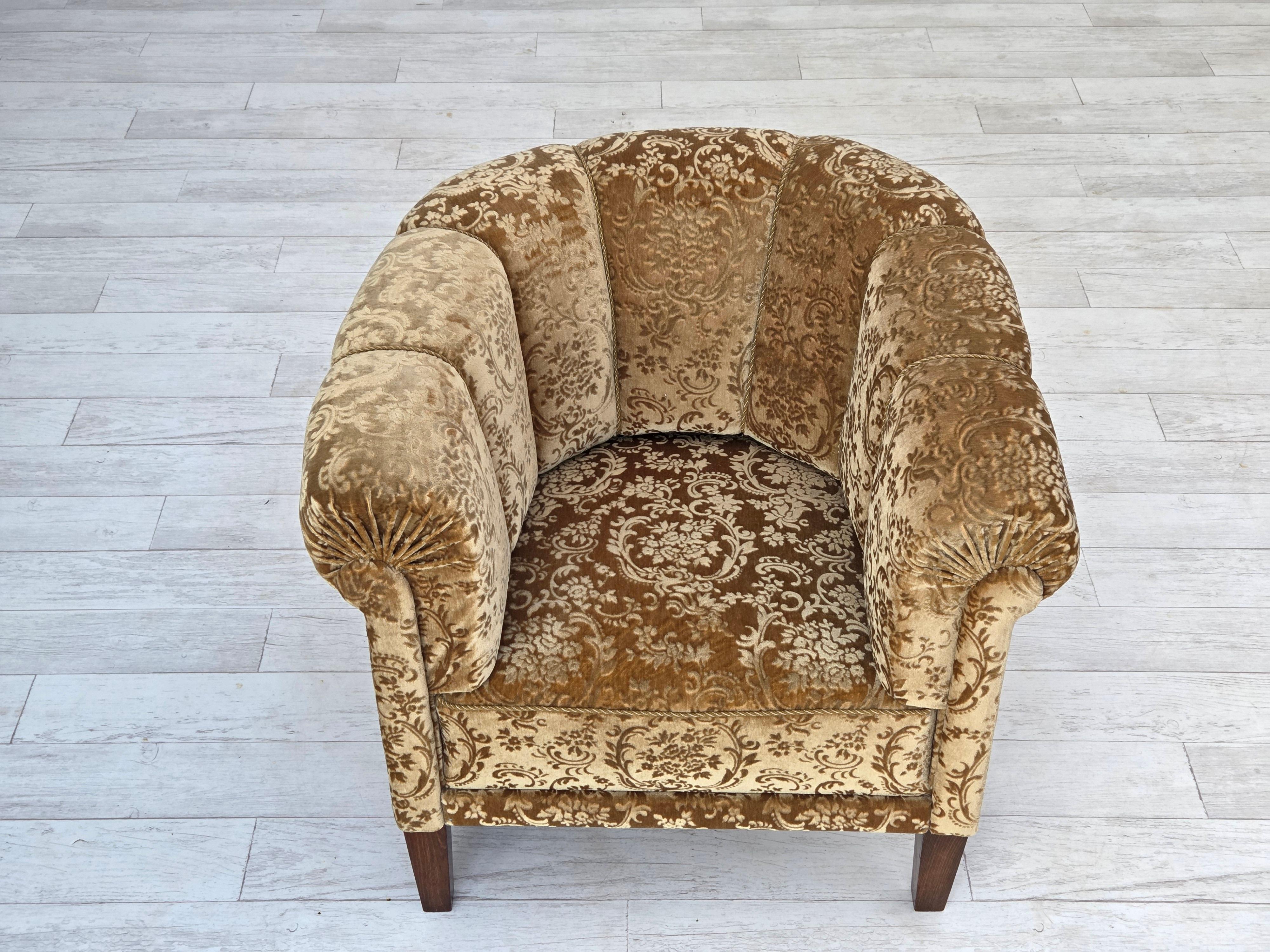 1960s, Danish vintage armchair. Green furniture velour, brass springs in the seat and back, ash wood legs. Chairs were reupholstered by craftsman about 15 years ago. Very good condition: no smells, no stains and stable construction. Manufactured by