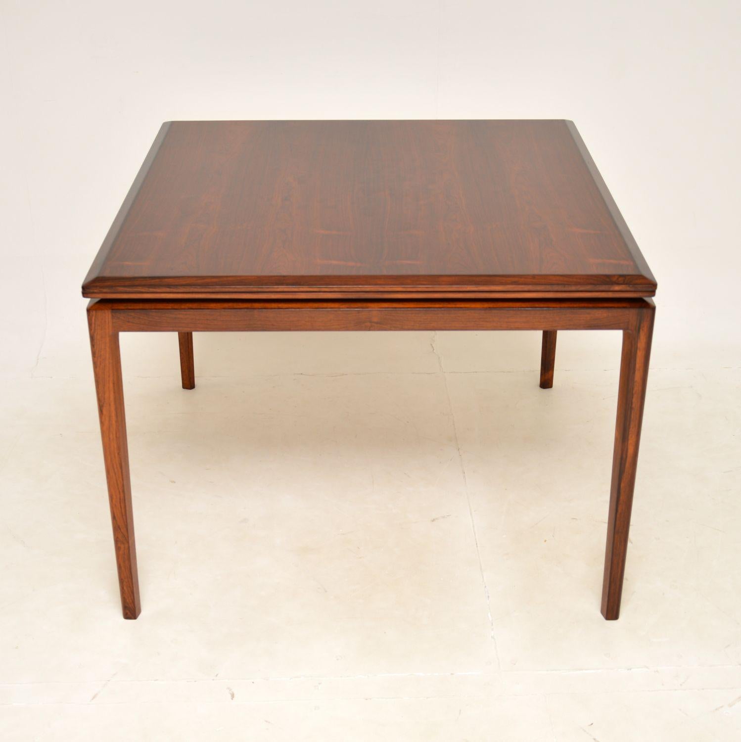 A stylish and exceptionally rare vintage Danish dining table. This was designed by Ib Kofod Larsen for Christensen and Larsen, it dates from the 1960s.

The quality is outstanding, this has a very sturdy yet also extremely elegant design. The